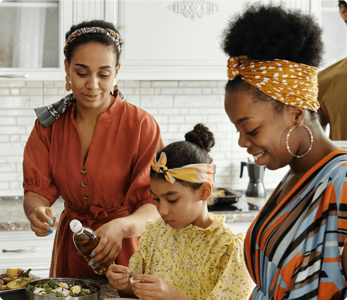 Lady cooking food with her family