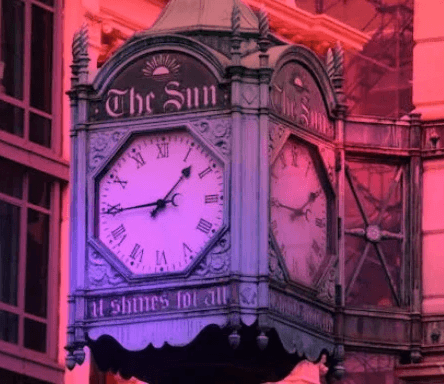 An old clock in a city square with the caption "The sun: it shines for all" (Photo by Matt Farmer)