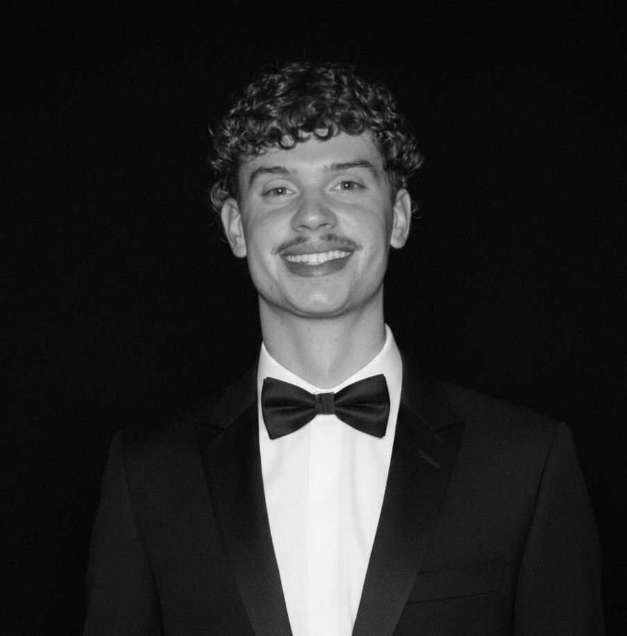 a blurry photo of a person standing in front of a wall