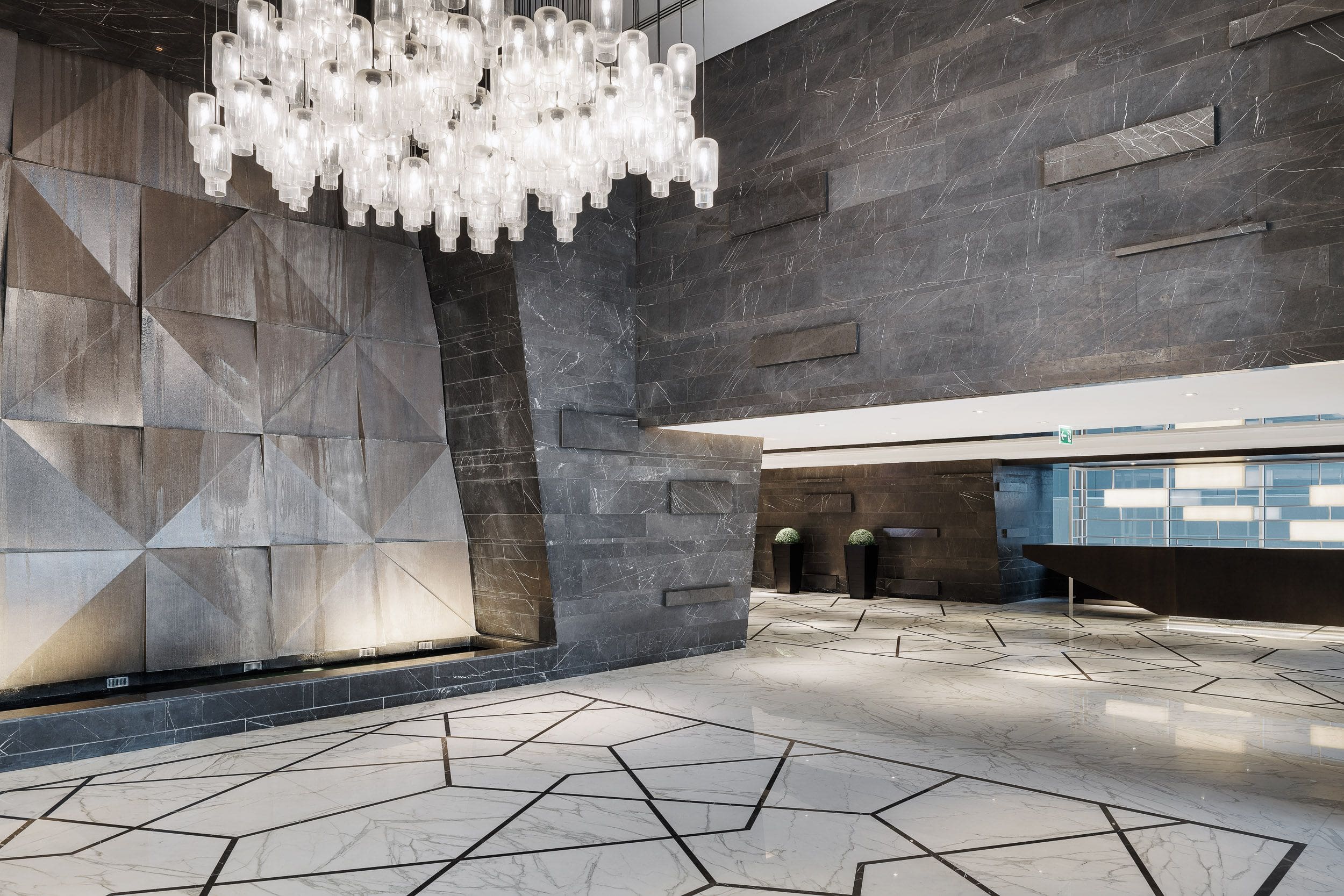 Elegant marble lobby and reception area, showcasing the high-end interior design of Burj Al Salam apartments.