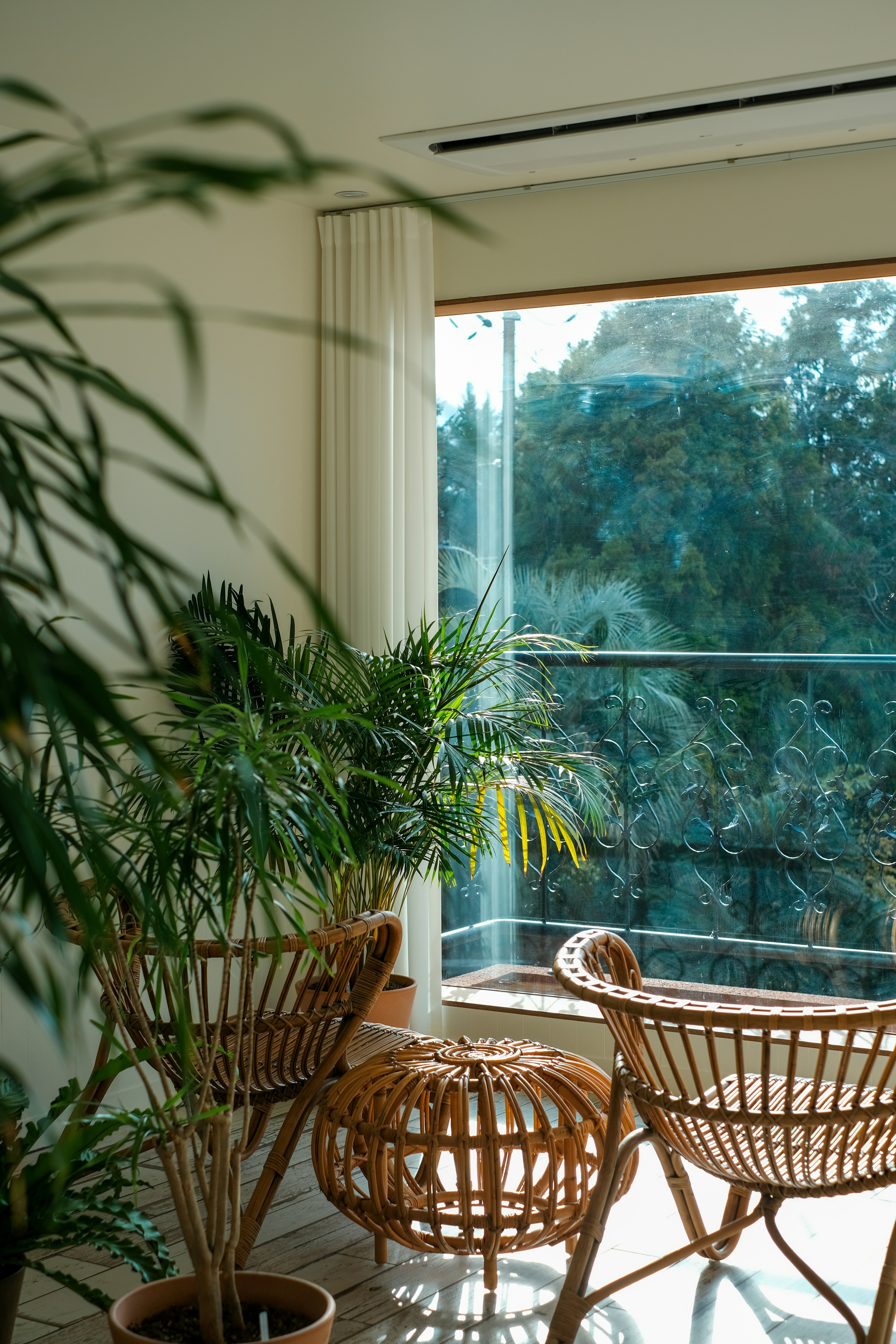 A living room filled with furniture and a large window