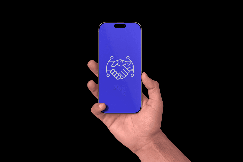 Hand holding a smartphone displaying the AI Trust Signals digital handshake logo on a blue screen, emphasizing mobile technology and trust.