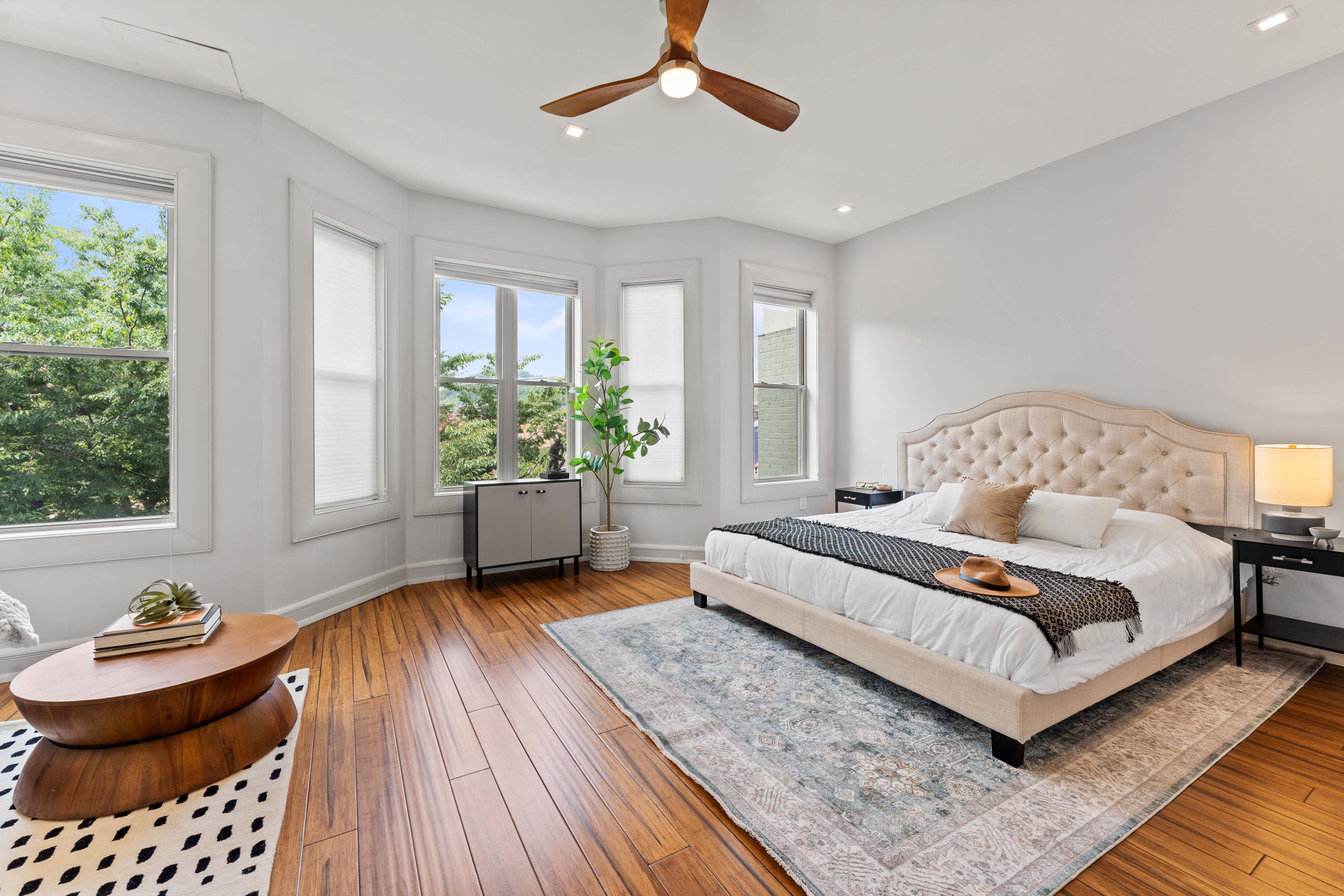 brown wooden house with green plants