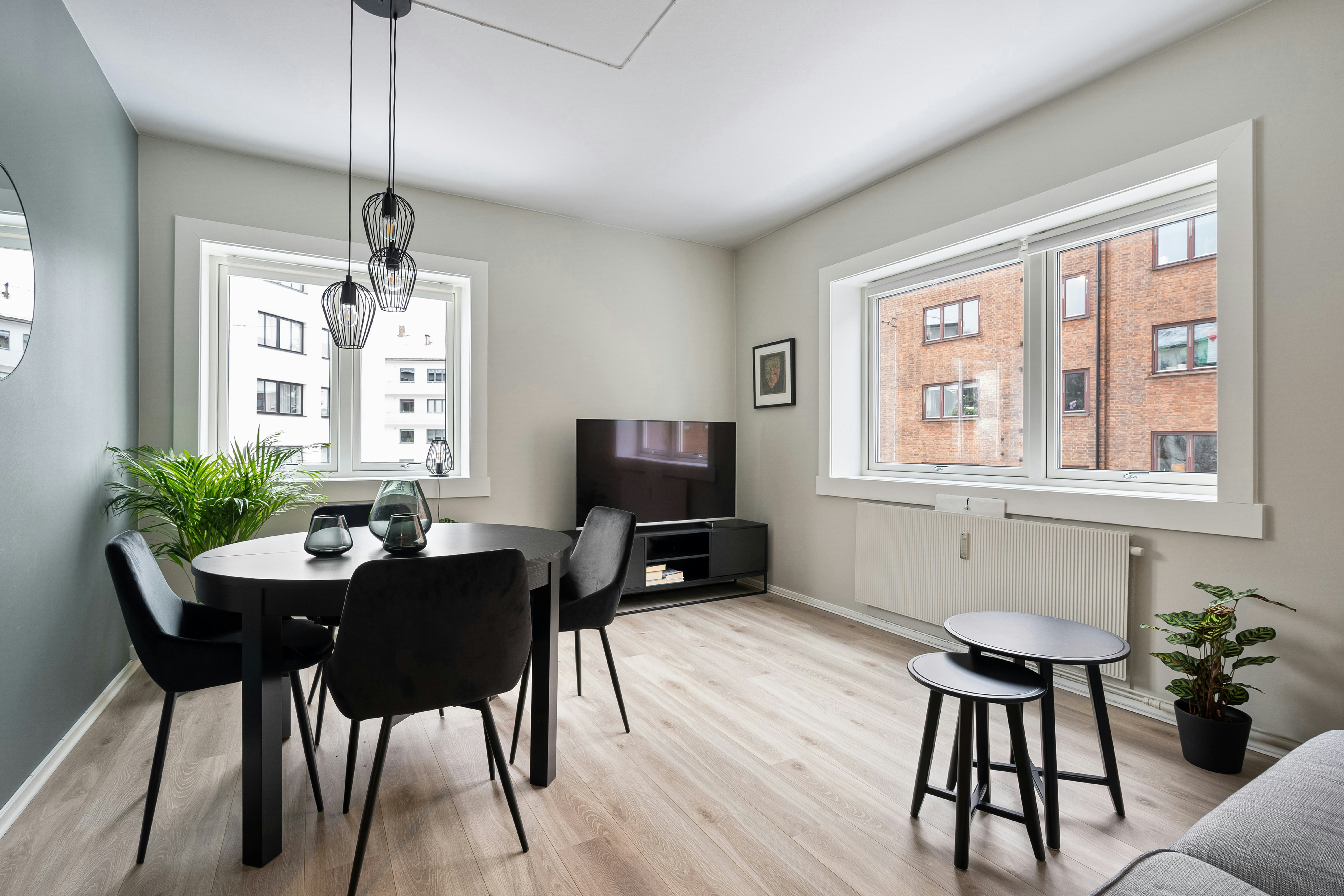 A living room filled with furniture and a flat screen TV
