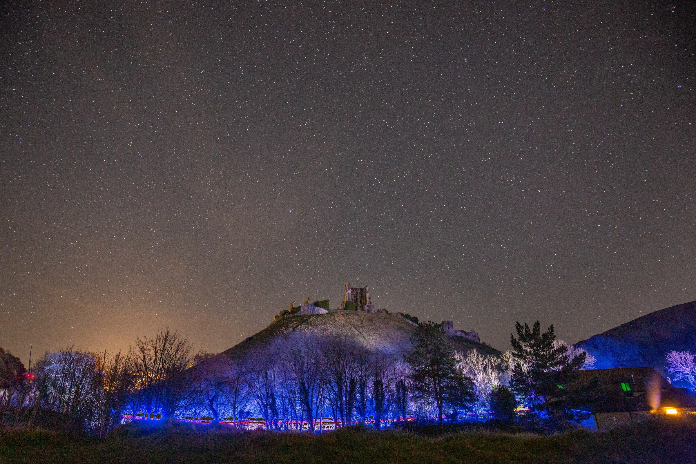 LANDSCAPE · Corfe Castle beneath the stars.