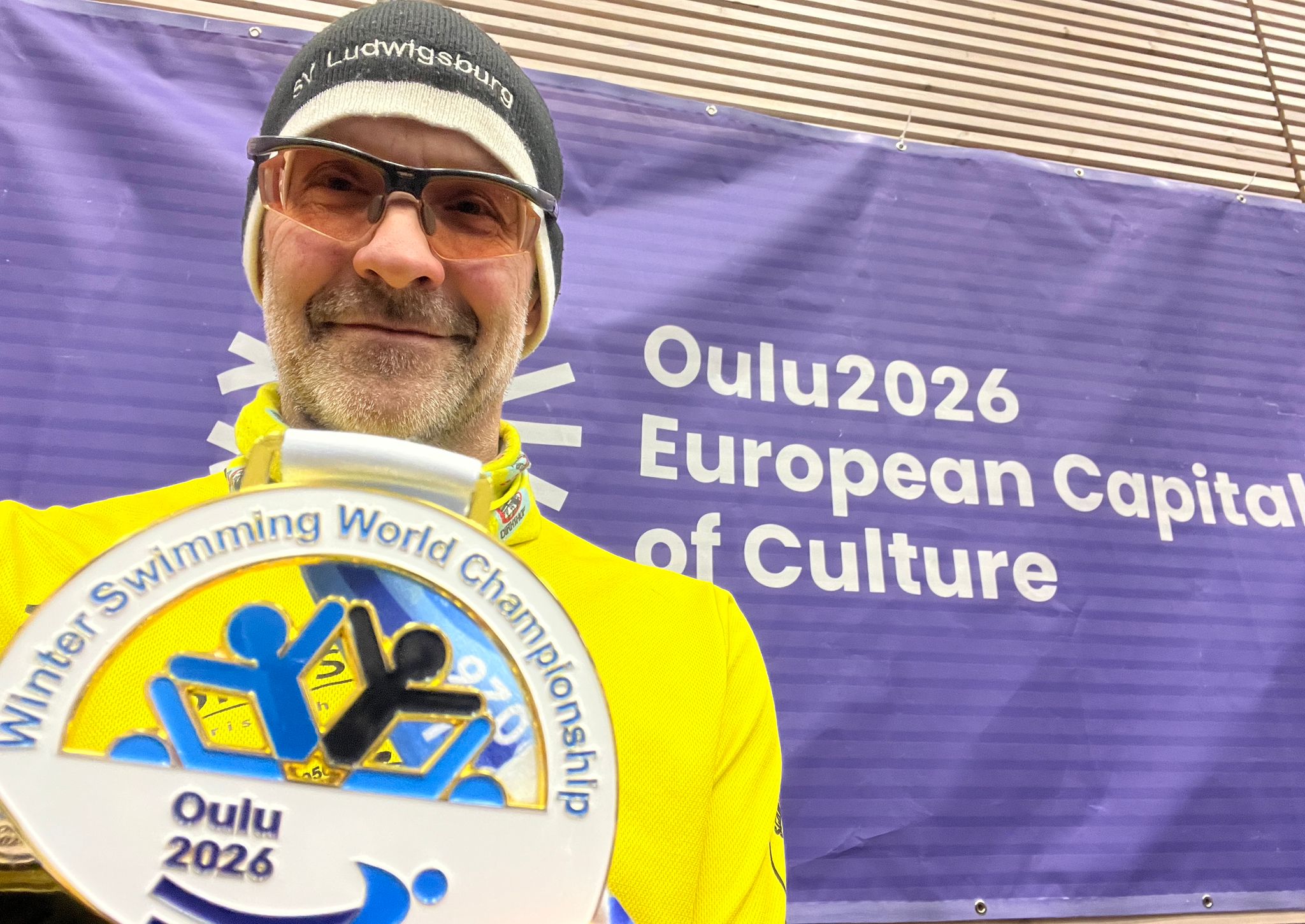 five people swimming on pool