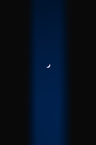 Night sky gradient with small moon detail
