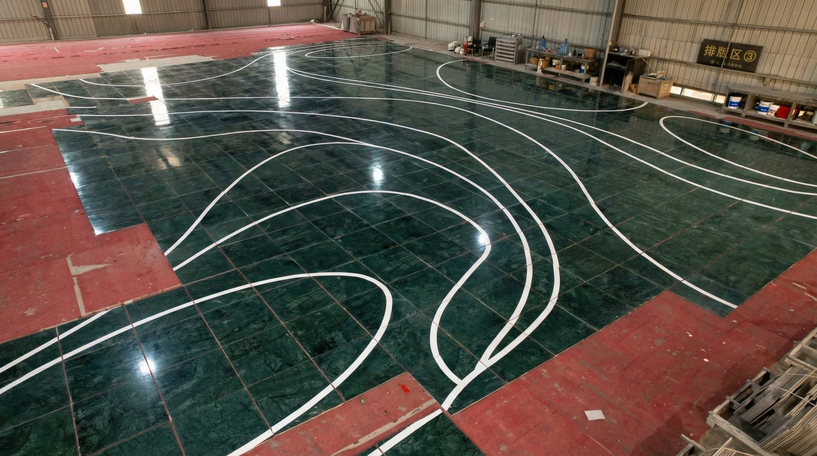 Completed subway station hall featuring futuristic lit-up walls and curved marble floor patterns by NOVA STONE.