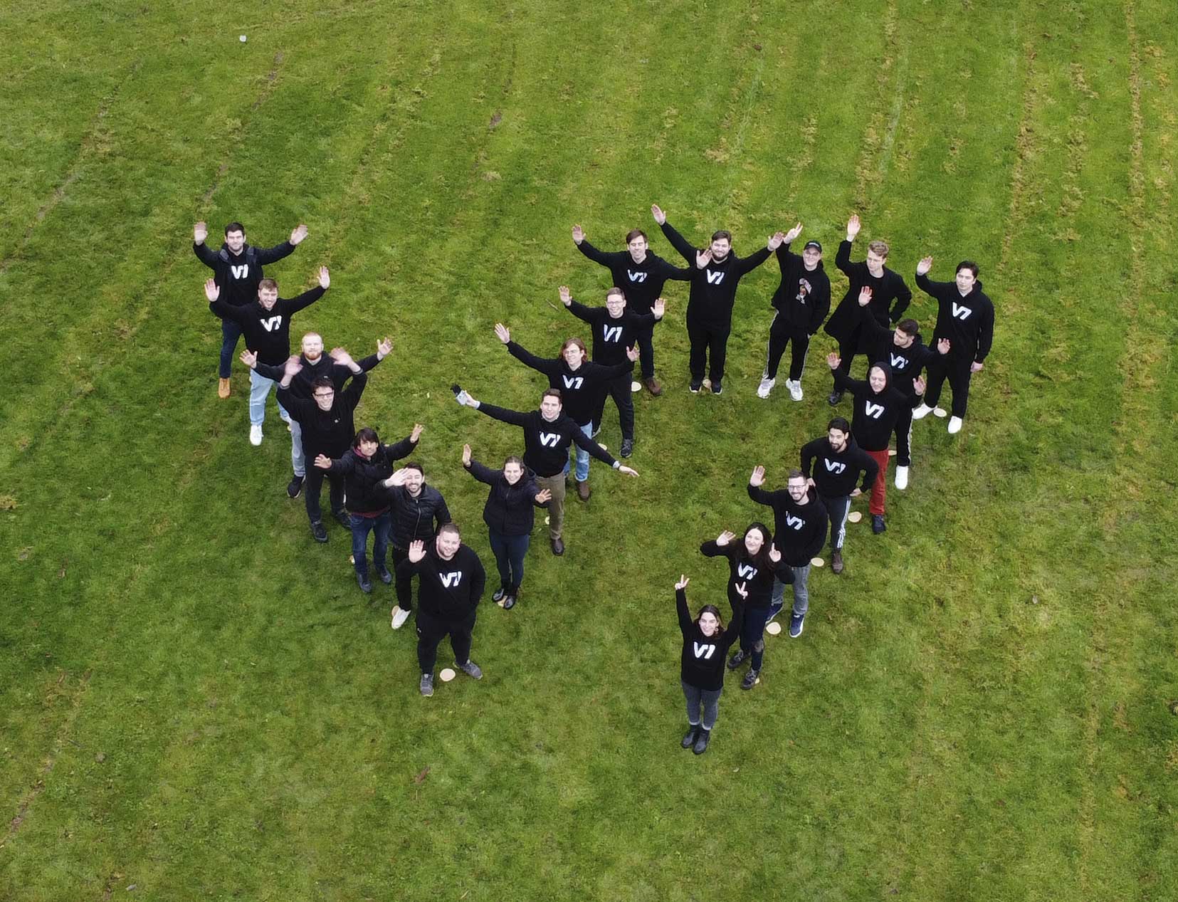 A drone shot of the V7 team