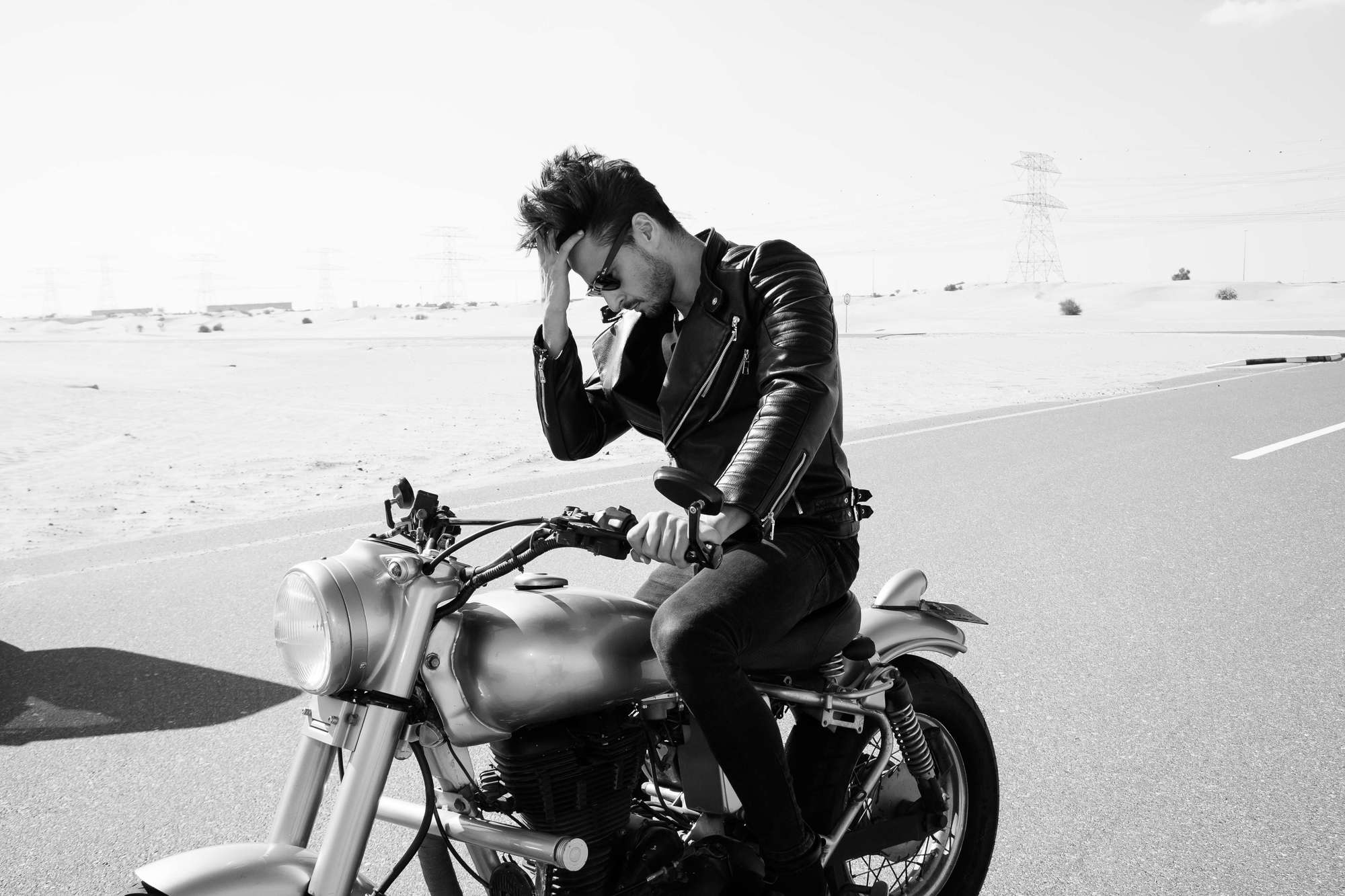 Black and white of a guy on a bike | Bonanza Satrangi’s: Perfume TV Commercial Production | Relity Group