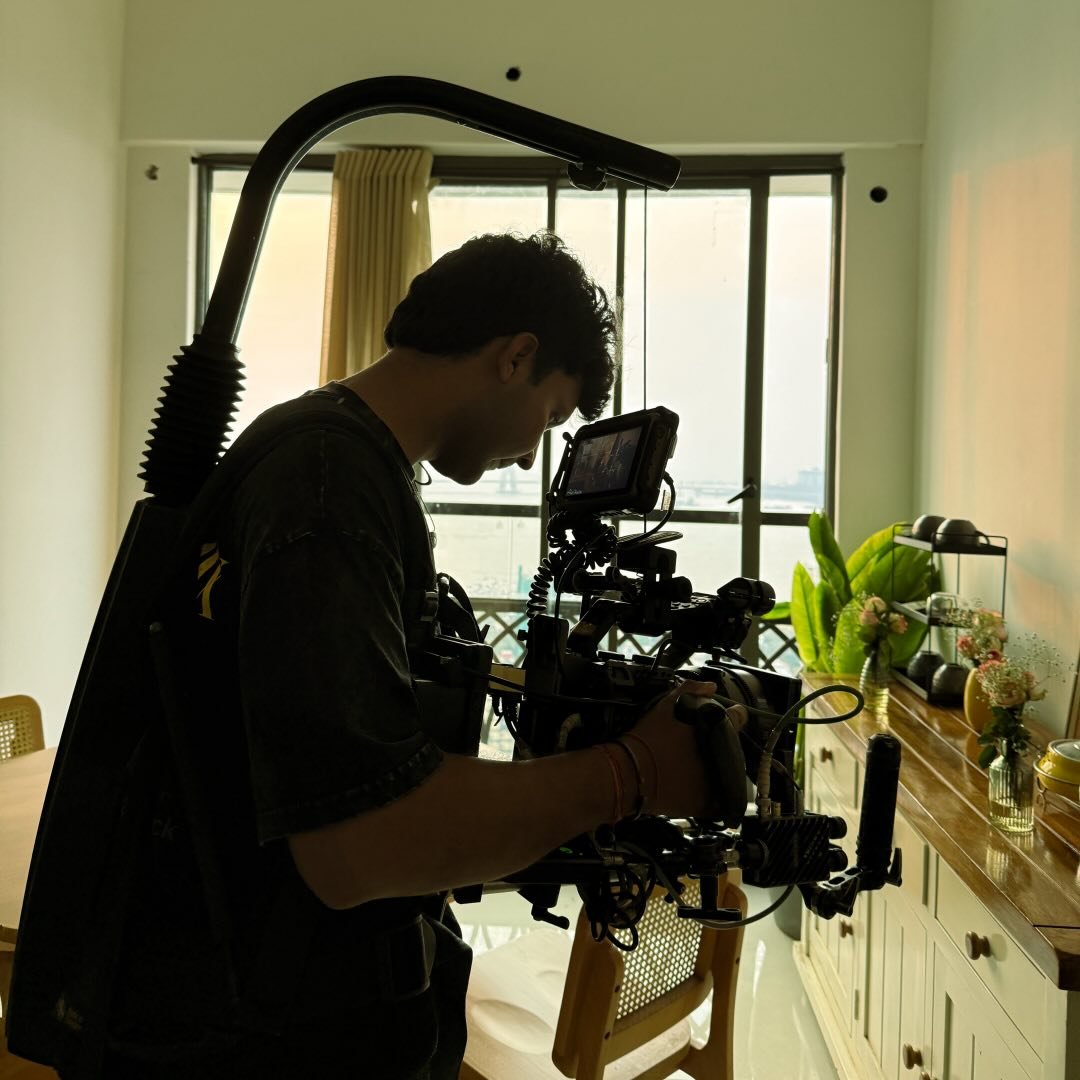 woman in red cardigan smiling