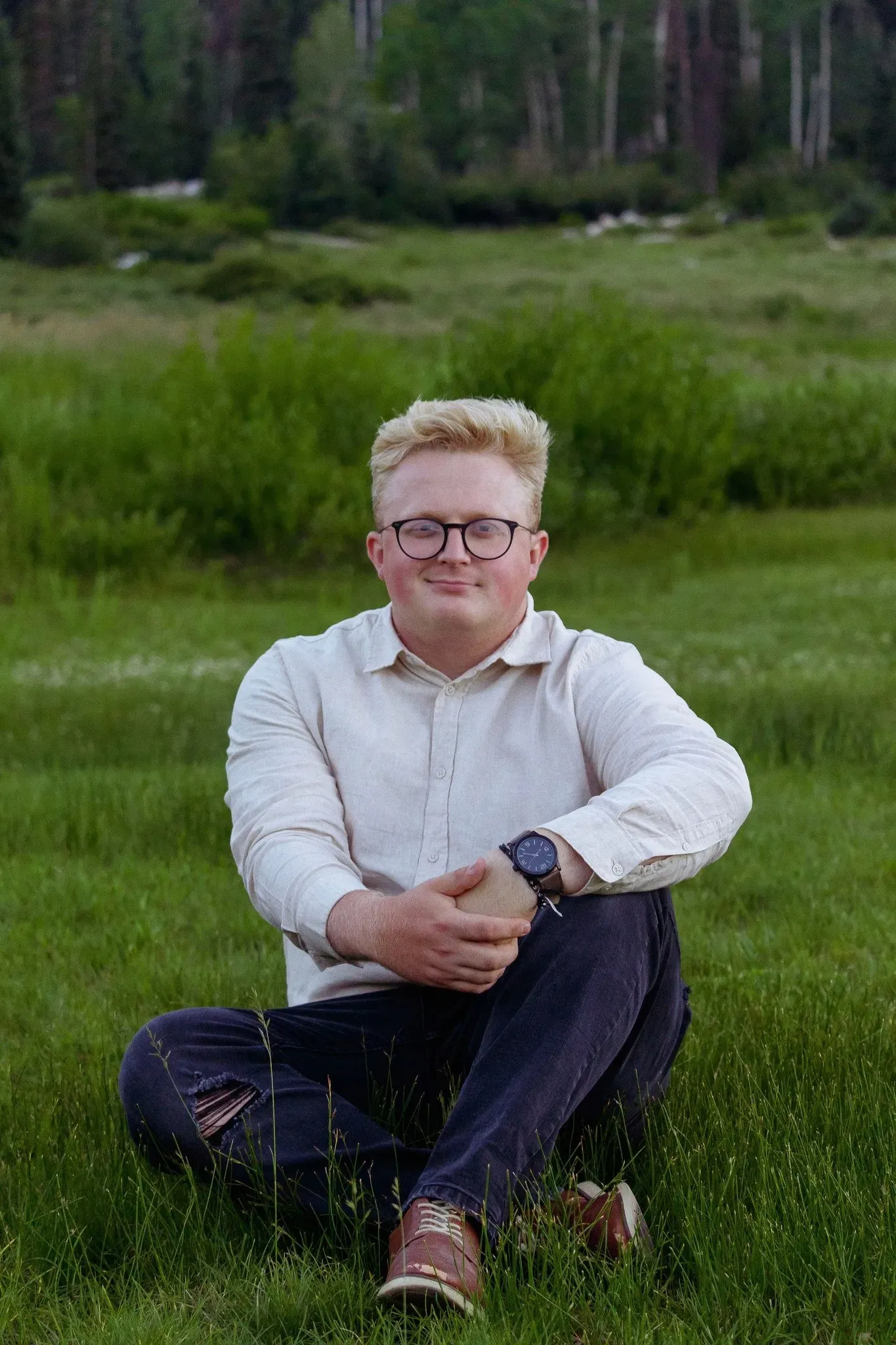 Man sitting in grass