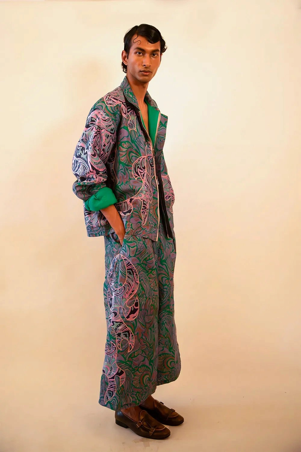 Our one-of-a-kind unisex dragon patchwork bomber and wide pant set is handcrafted by skilled artisans in-house using vintage textiles. 