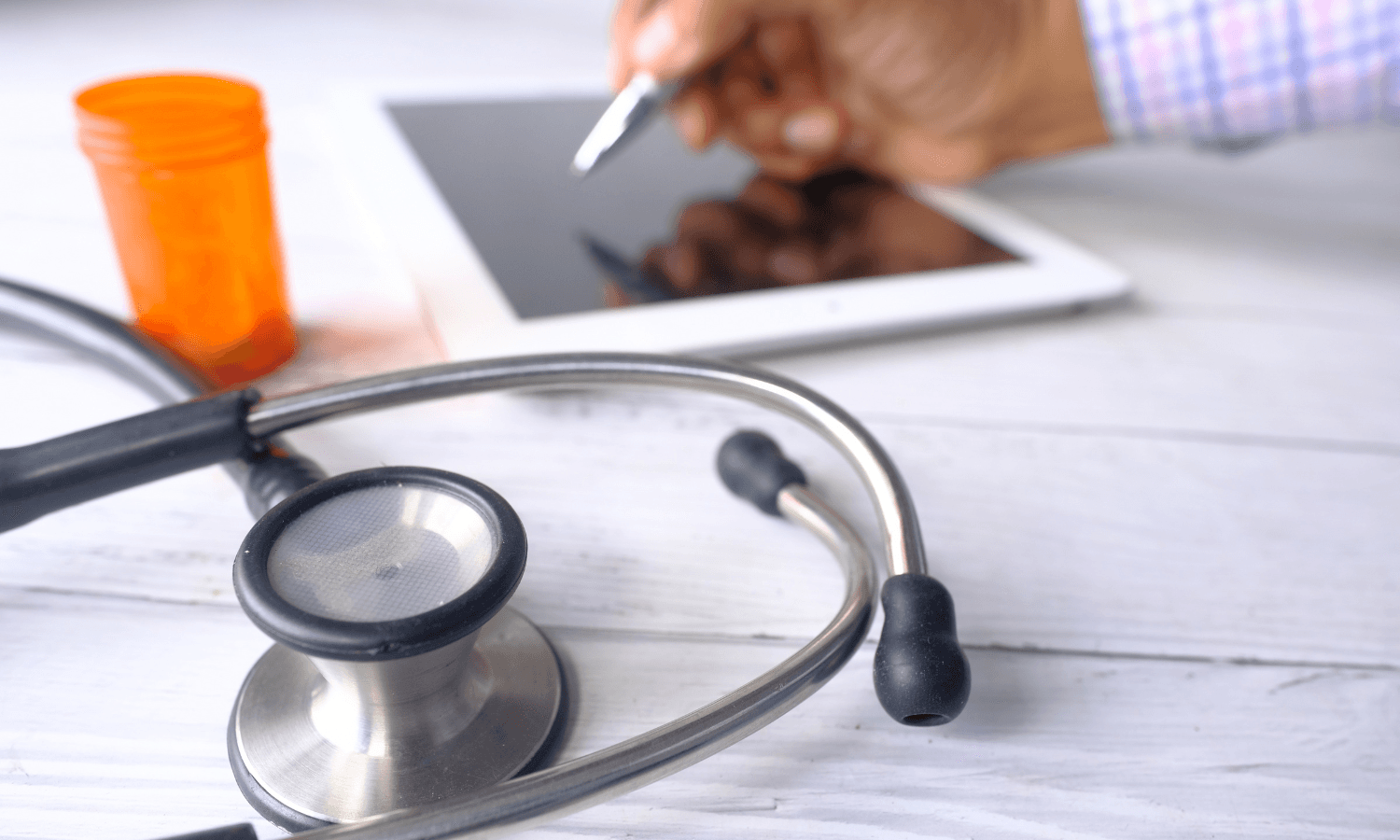 Stethoscope and pill bottle