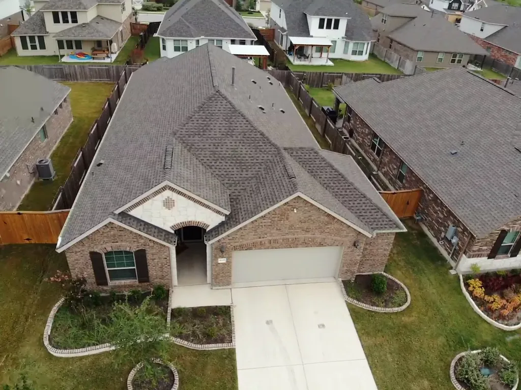 Aerial view of the architectural shingle roof in Pflugerville, Texas, completed in 2020