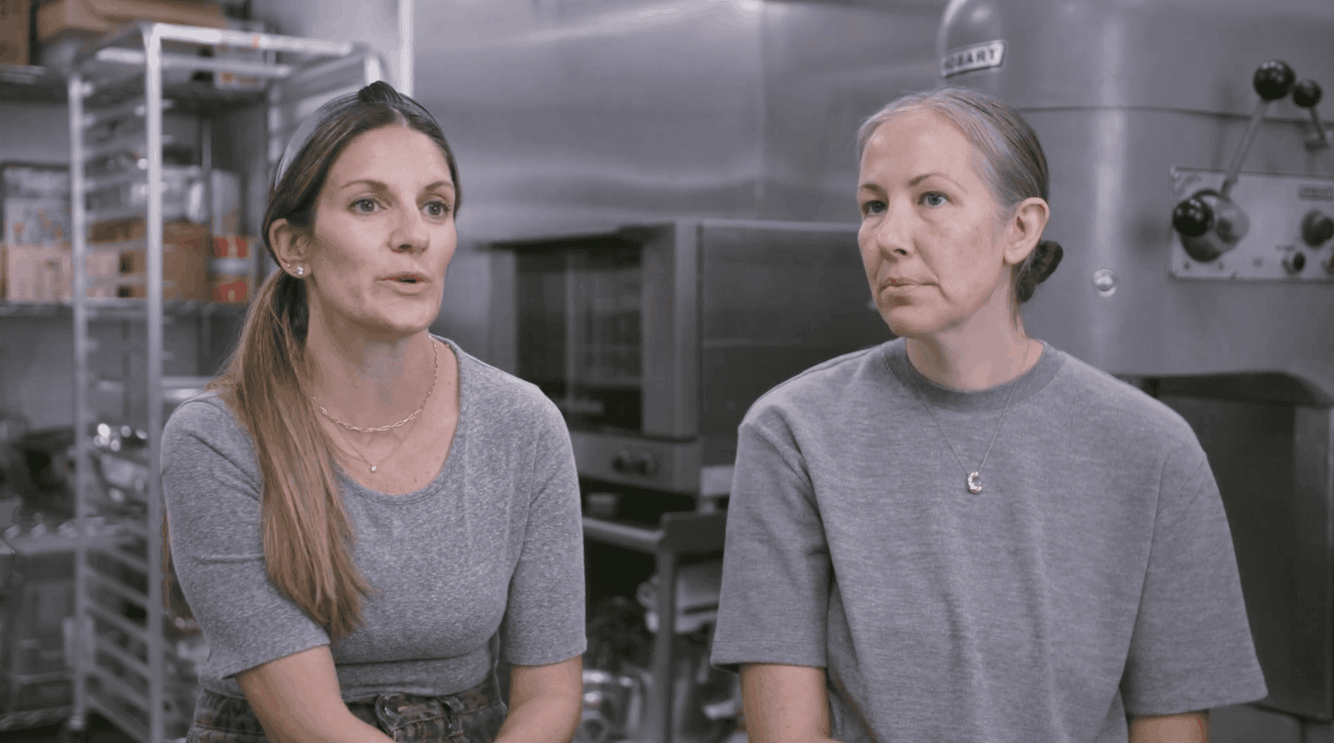 two chefs sit in their cloudkitchens facility for an interview