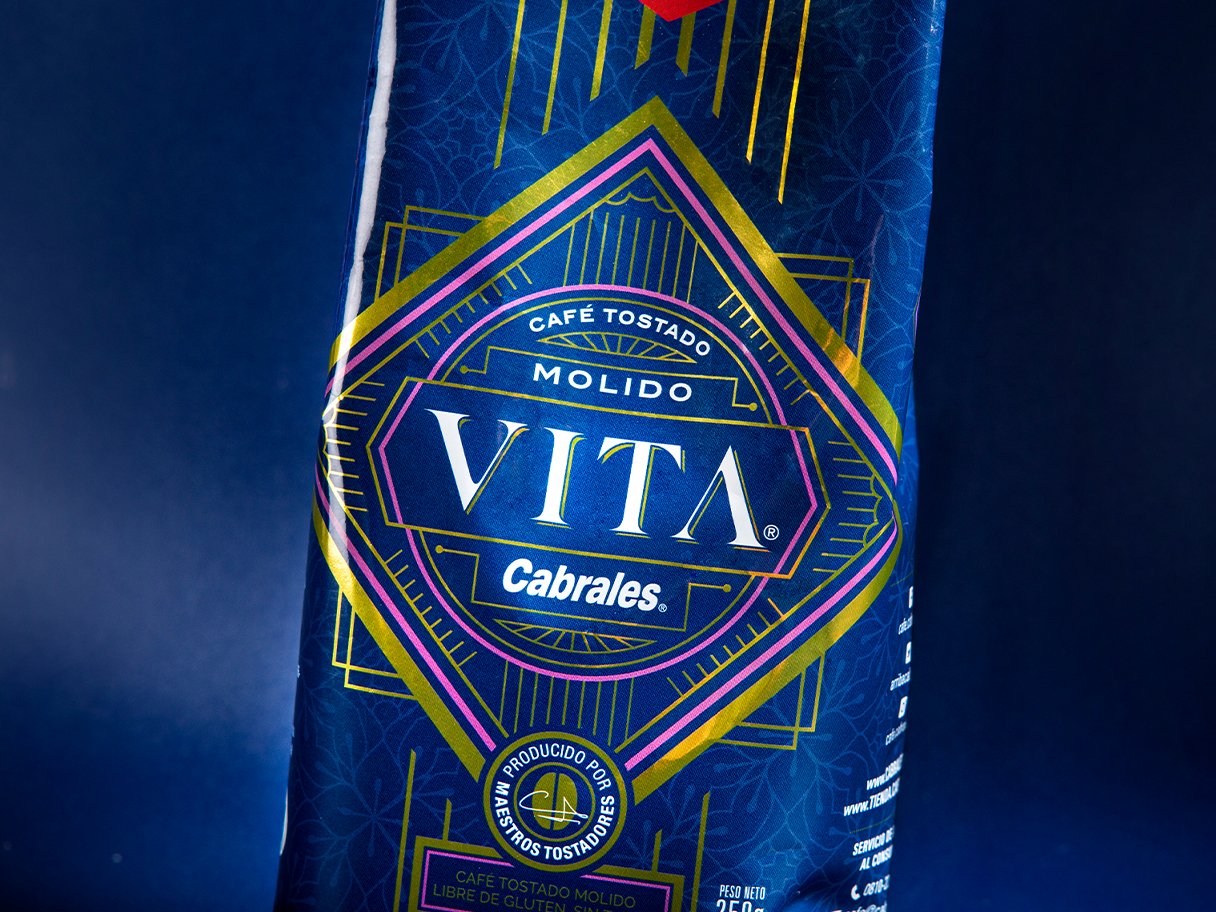 Rooftops of a coastal town with the sea in background