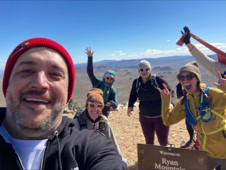 a black and white living room with a large tv