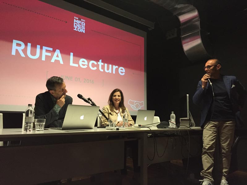 presentation room with three people