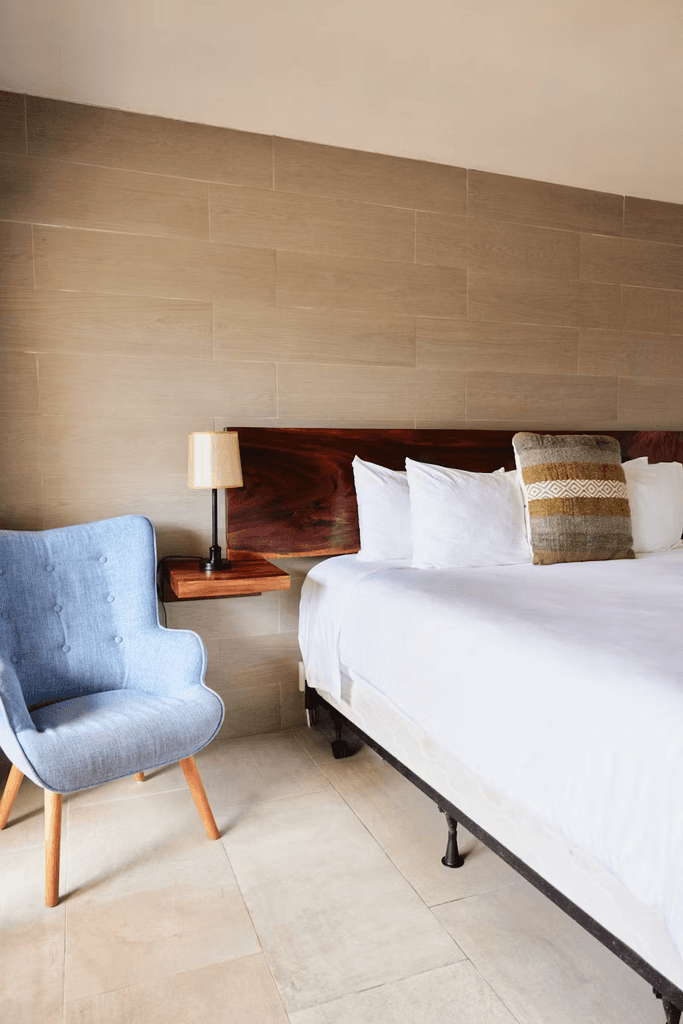 A joyful couple stands together.