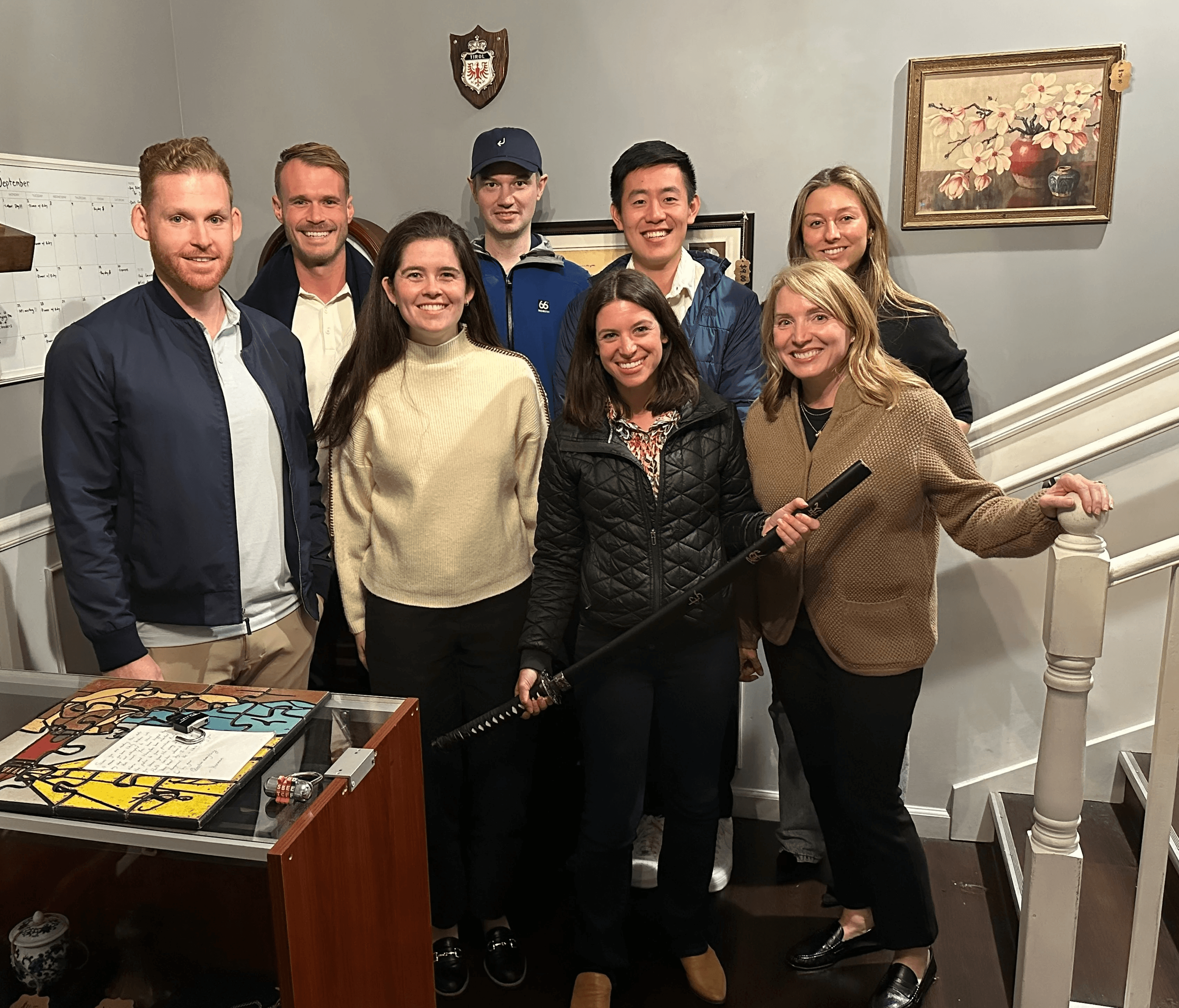 GC AI employees smiling at a social gathering