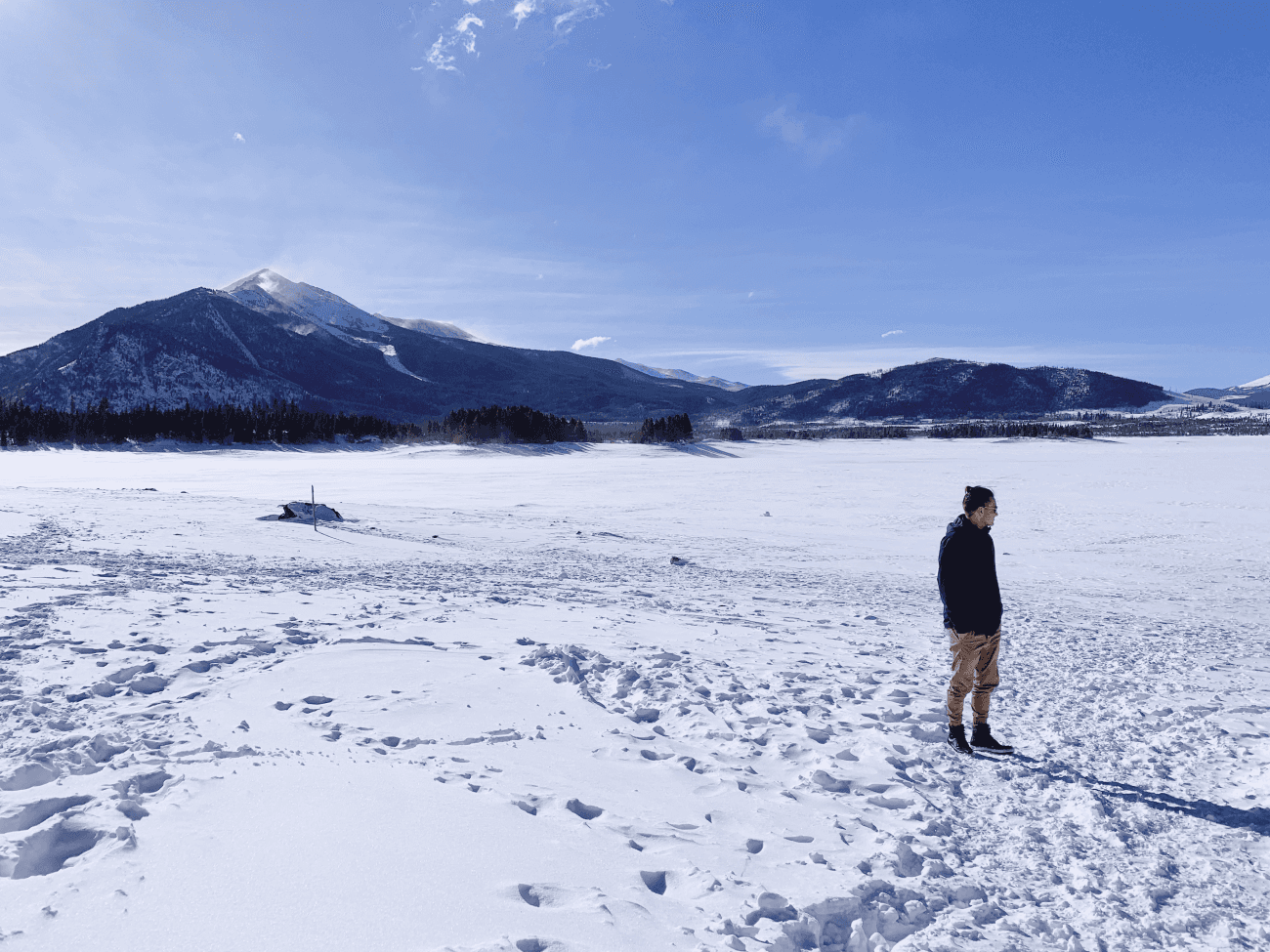 An image of Sam near a mountain.