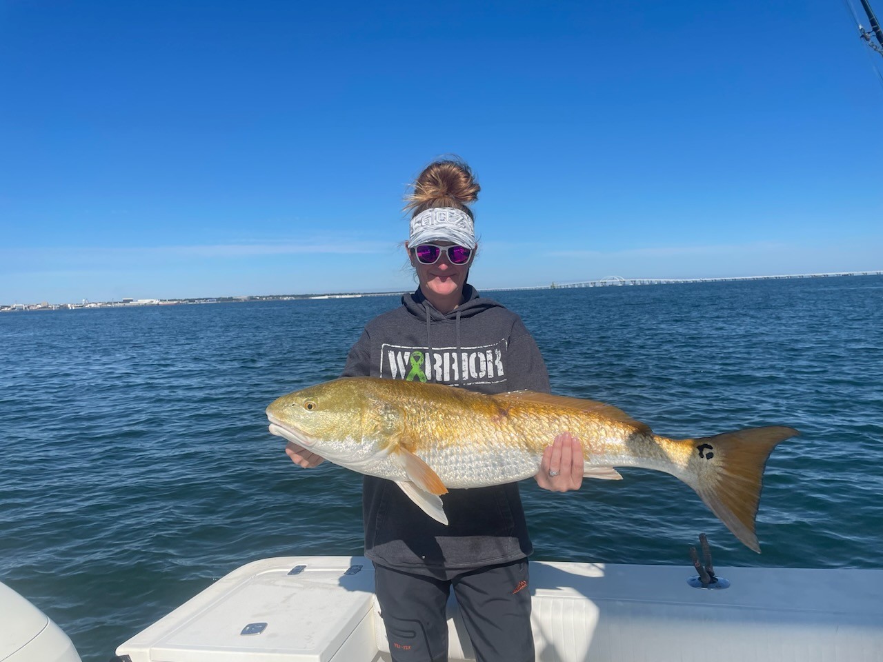 Woman holding a Redfish