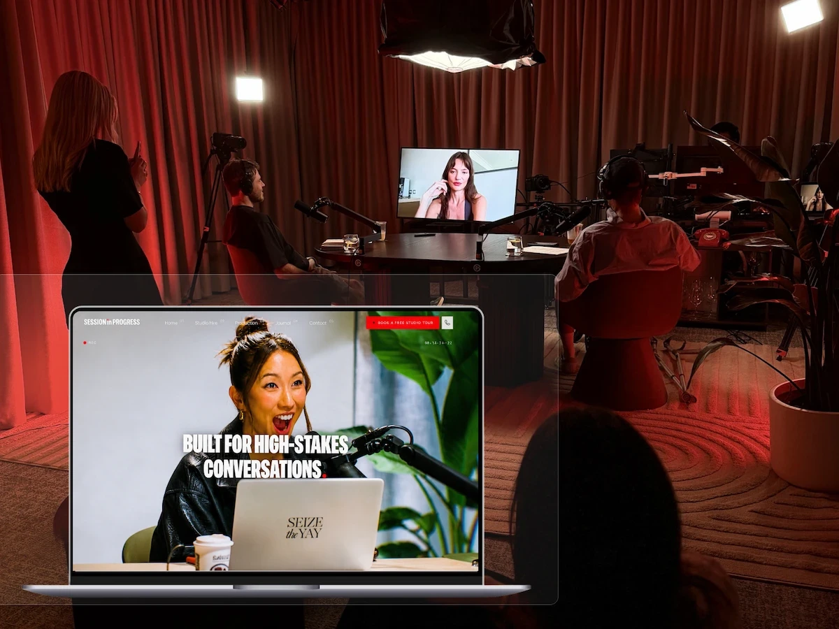 Session in Progress podcast studio website shown on a laptop in a live video recording studio