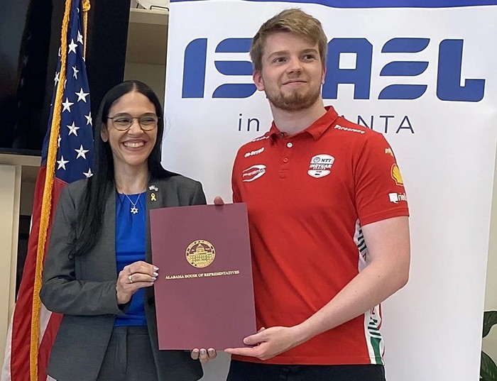 Anat Sultan-Dadon, consul general of Israel to the Southeastern United States, and Robert Shwartzman as he receives an Israel proclamation from the Alabama Legislature at Barber Motorsports Park on May 2, 2025. Photo courtesy of Larry Brook.