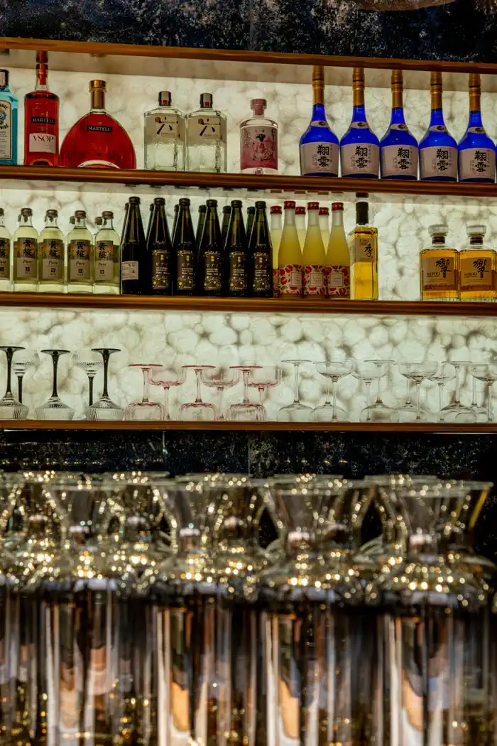 The backlit onyx bar with its Japanese sakes, gins and whiskies