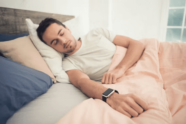 A smartwatch screen showing overnight sleep-tracking data