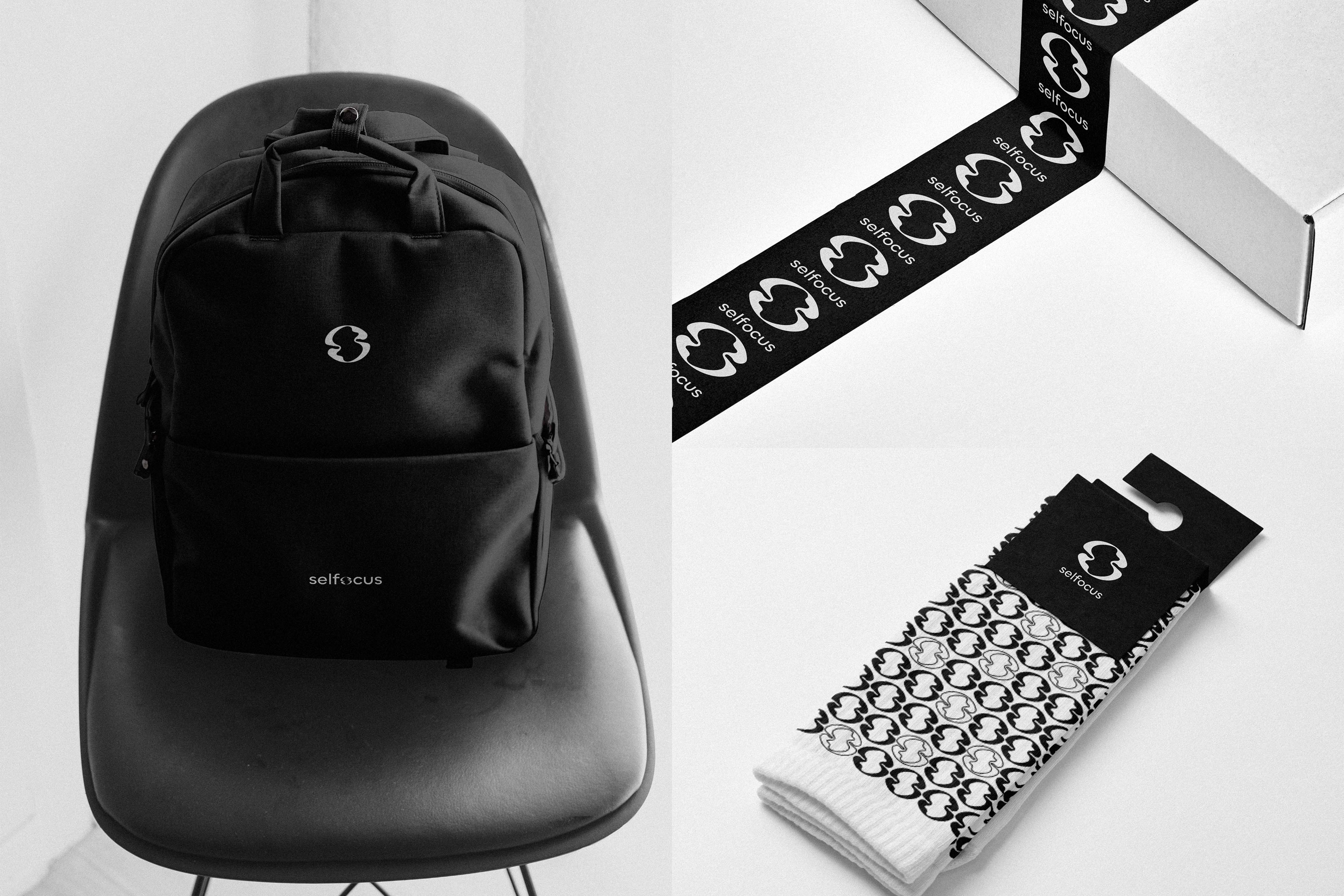 Thumbnail image: branded backpack, packing tape, and patterned sock packaging mockups - Selfocus, a social media brand identity.