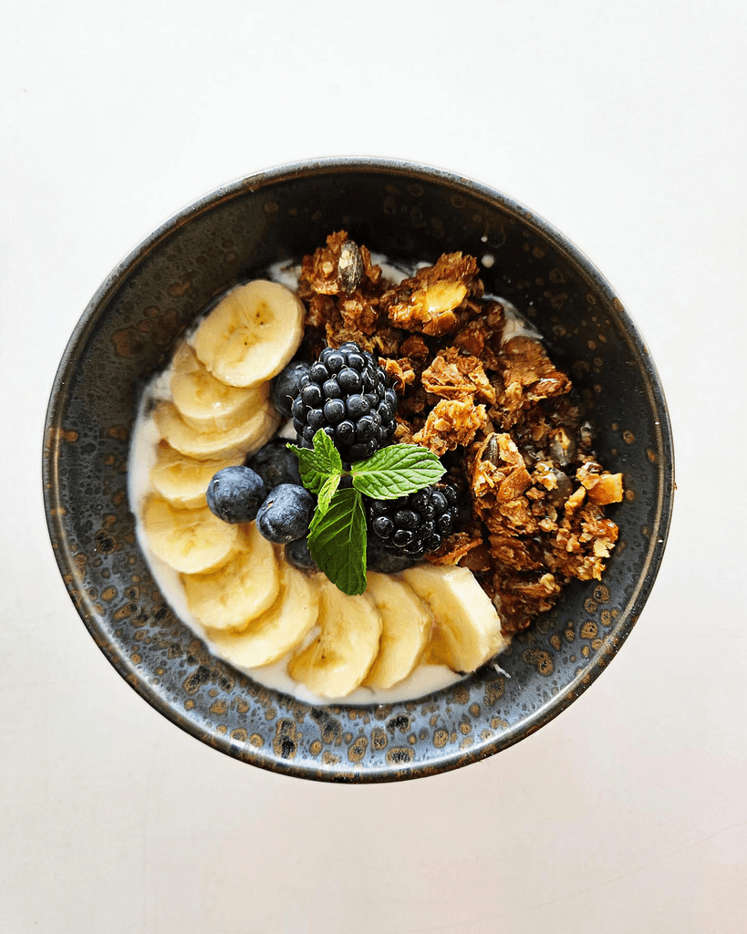 Seared scallops in a white plate