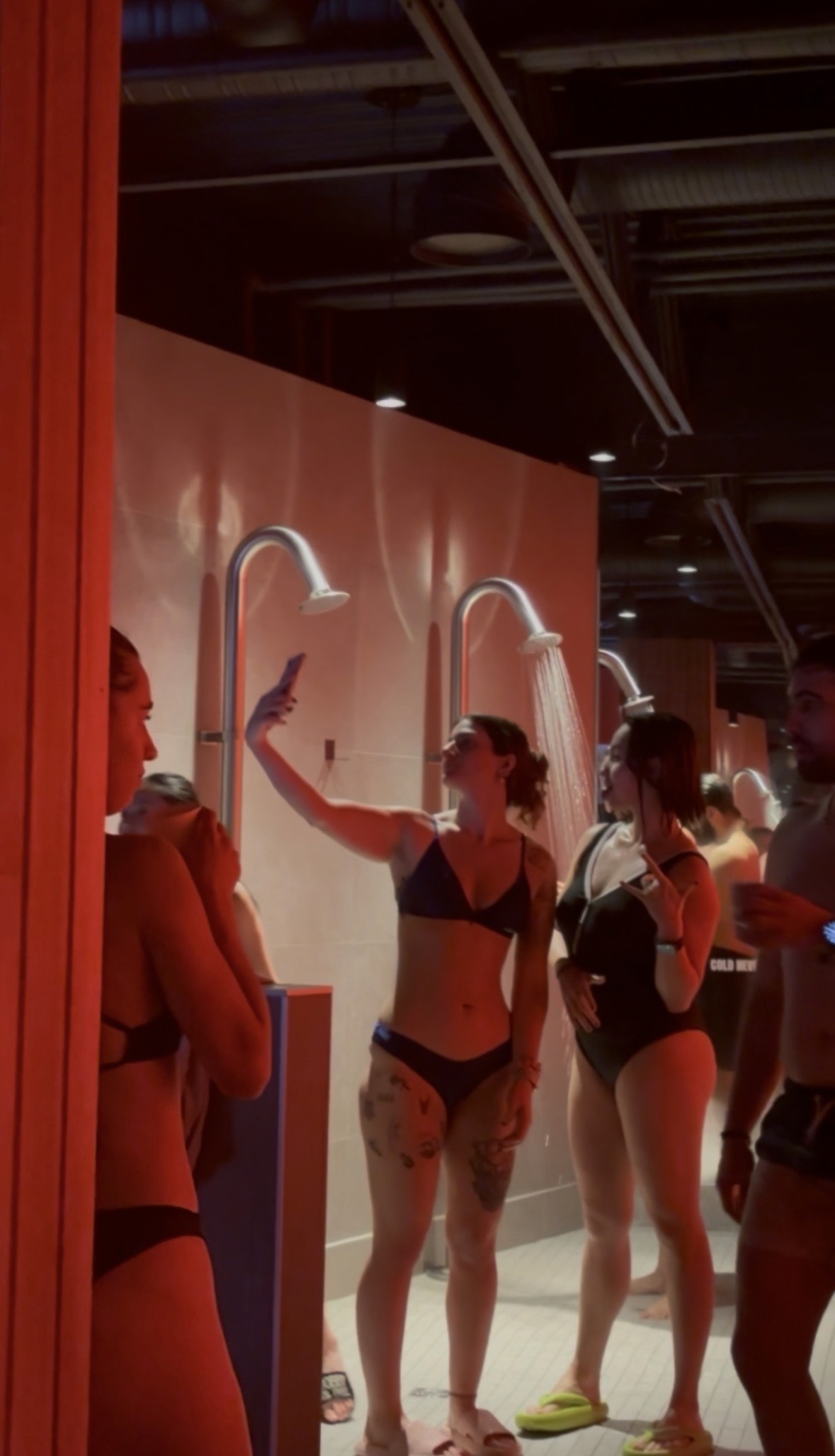 A woman laughing and connecting in nature during a mindfulness retreat, soft golden hour light, natural landscape, relaxed clothing