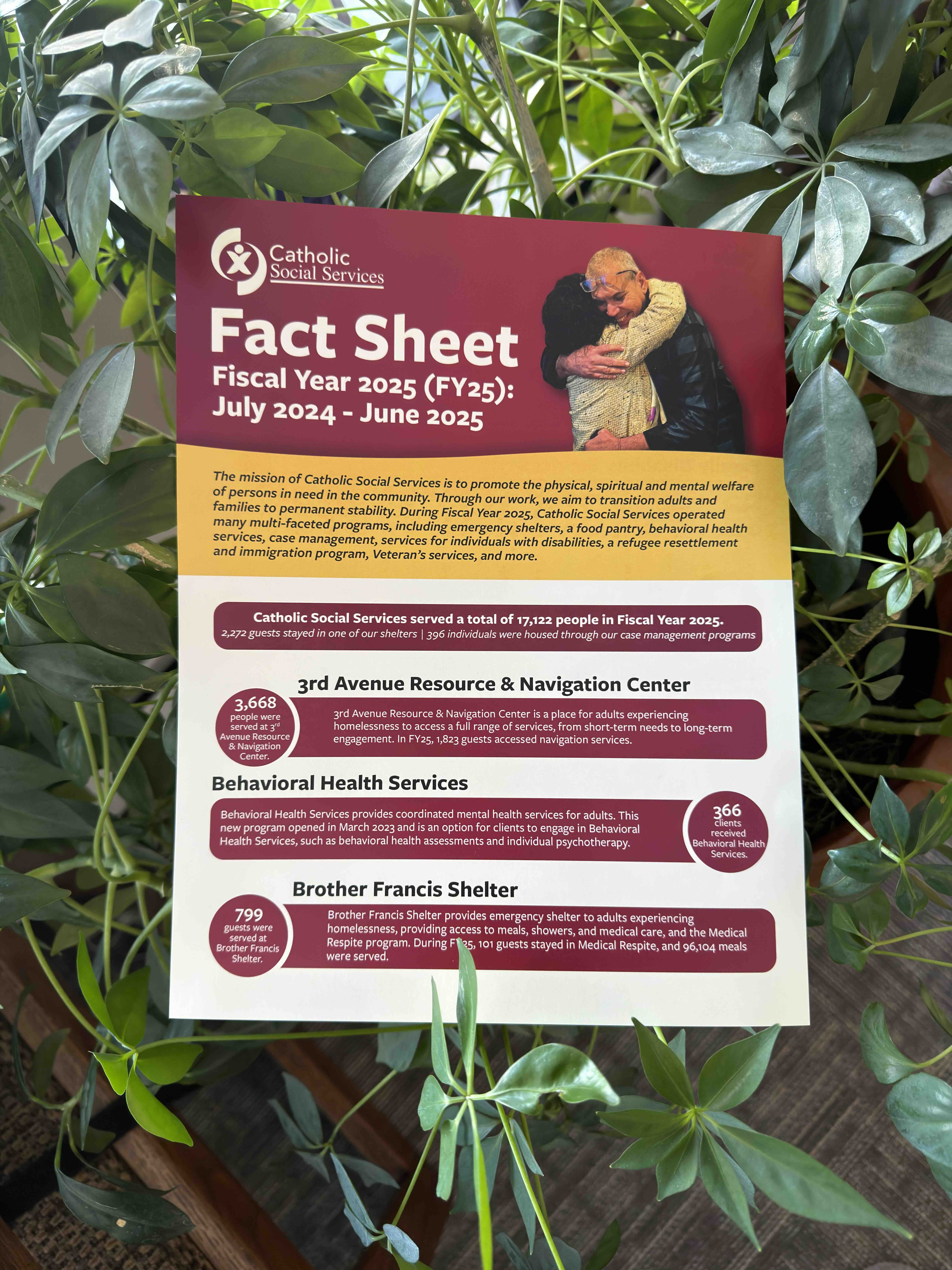 White outline of a classic smiley face followed by the text “Smiley Co” in white serif type on a vivid orange background.