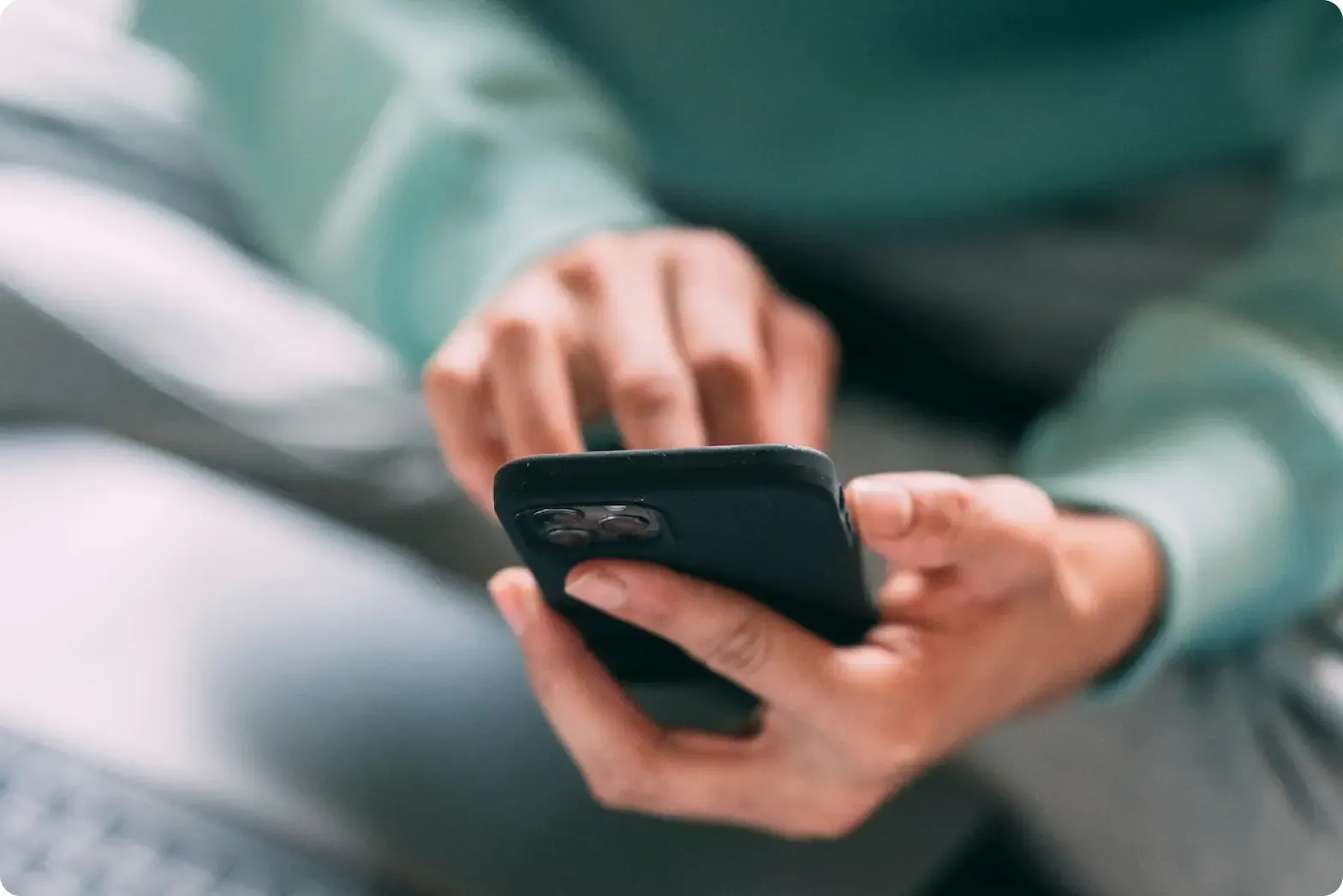 Someone interacting with an iPhone