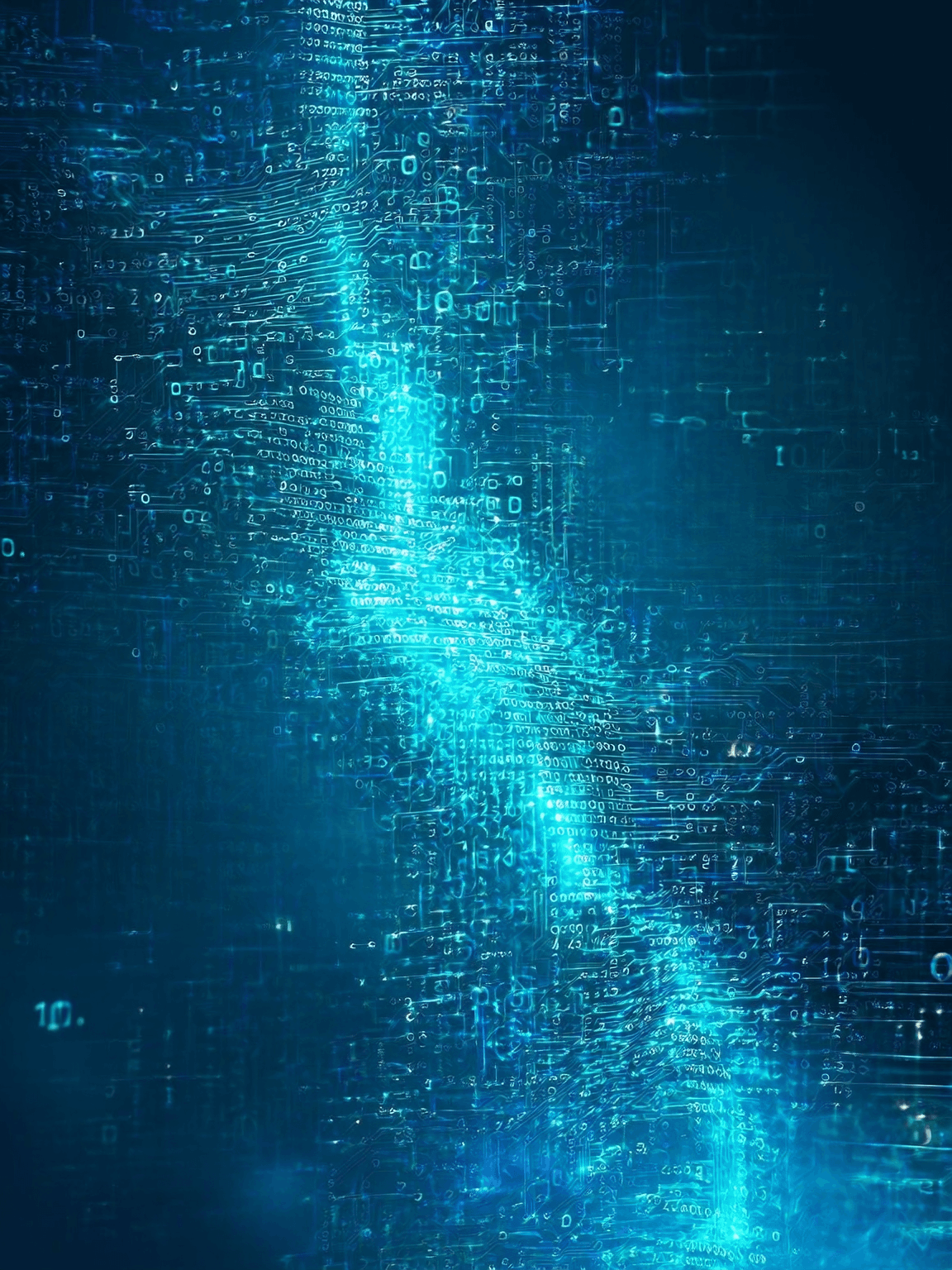 A smiling young man with crossed arms, wearing a plaid shirt and white t-shirt, poses against a dark background.