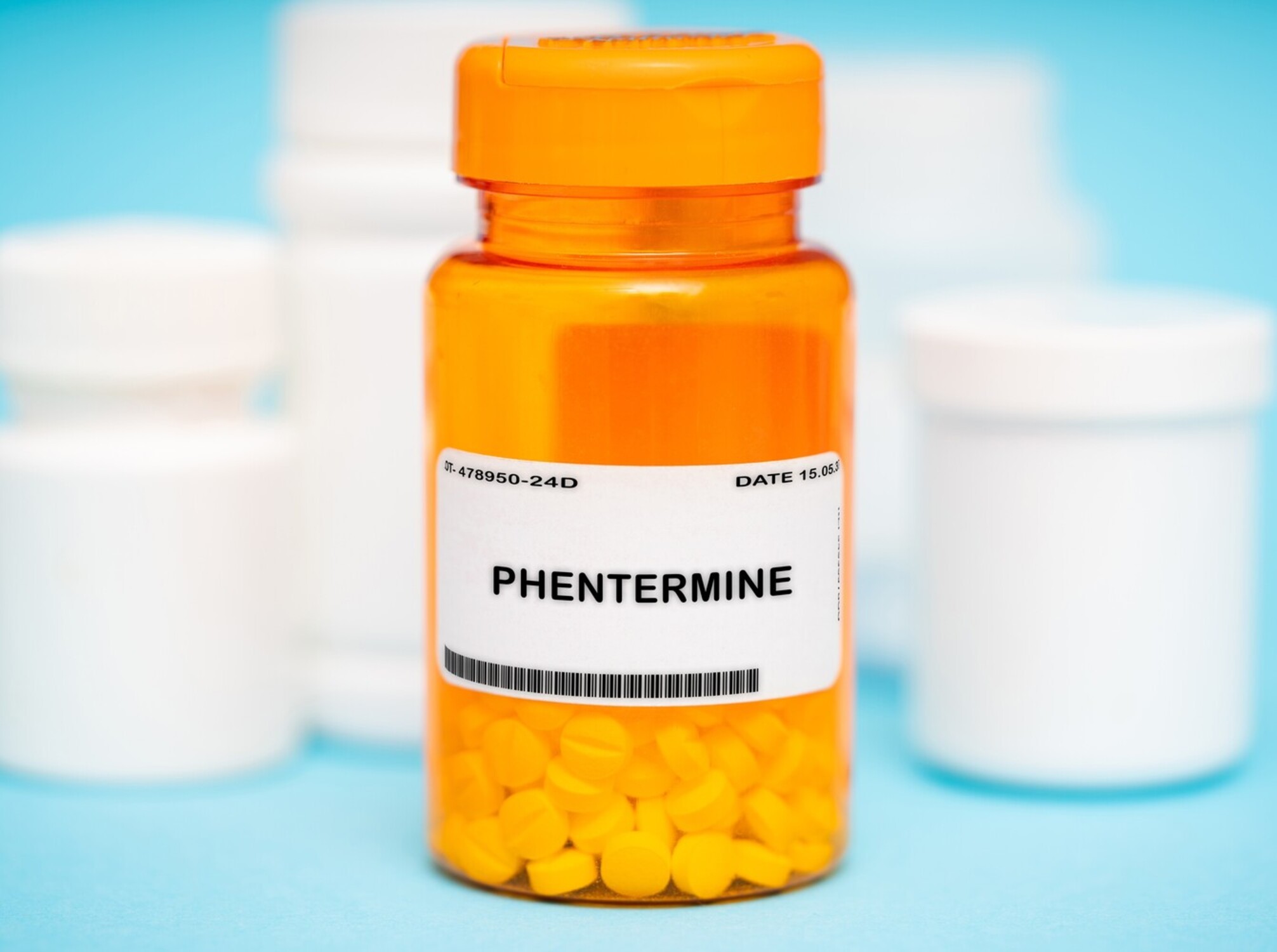 pill bottle with phentermine inside that can be used for a medical weight loss prescription