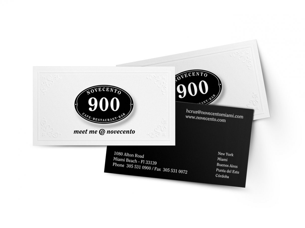 Rooftops of a coastal town with the sea in background