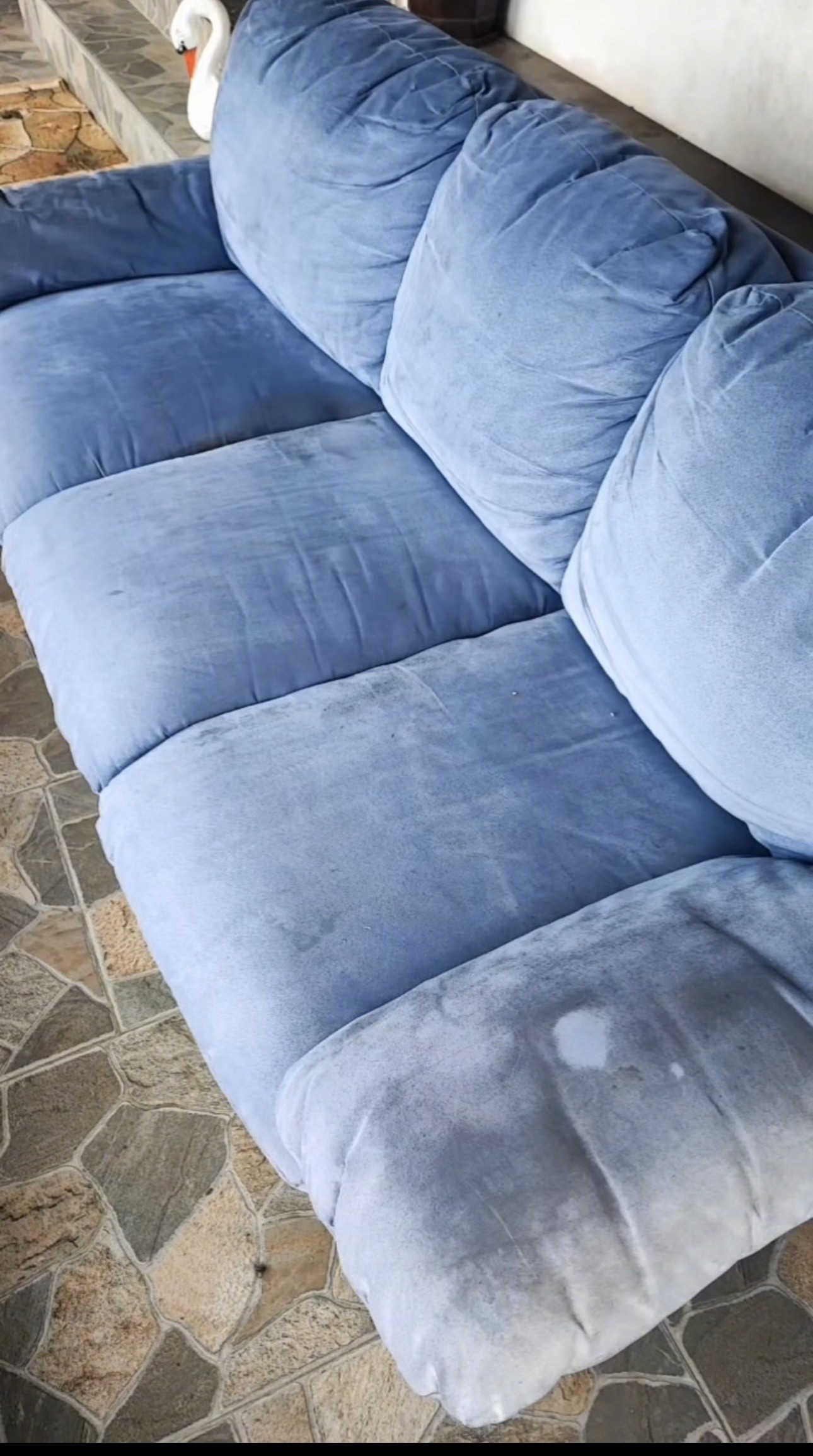 Dirty fabric sofa before professional extraction cleaning