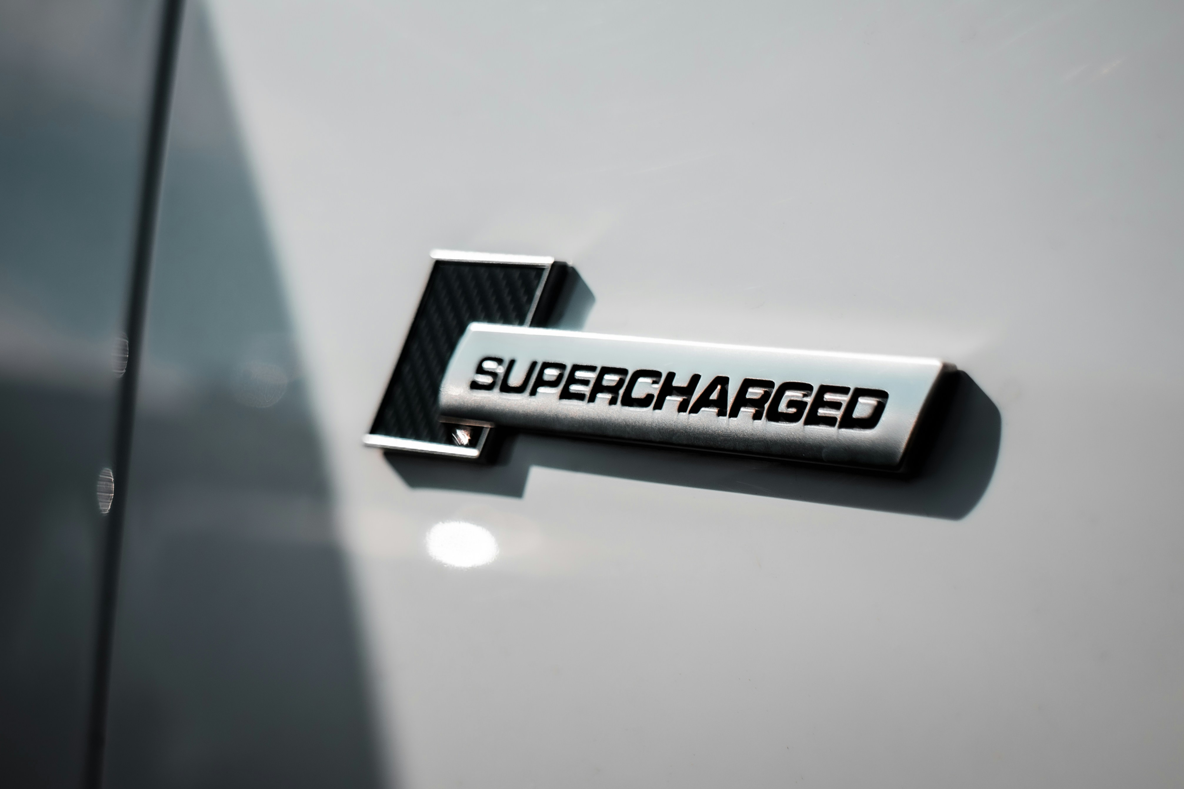 a close up of a badge on a car