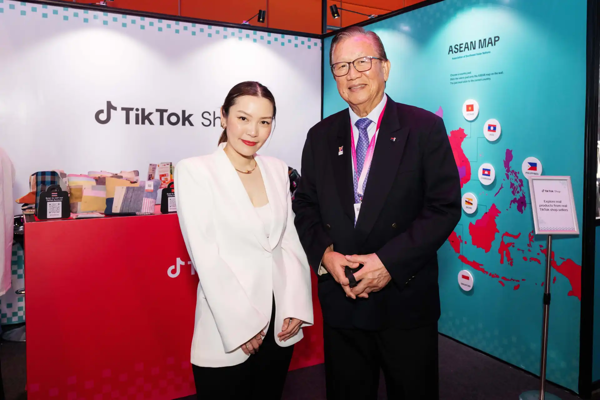 TikTok's Chanida Klyphun and George Barcelon of ASEAN-BAC Philippines at the TikTok Shop booth during ABIS 2025.