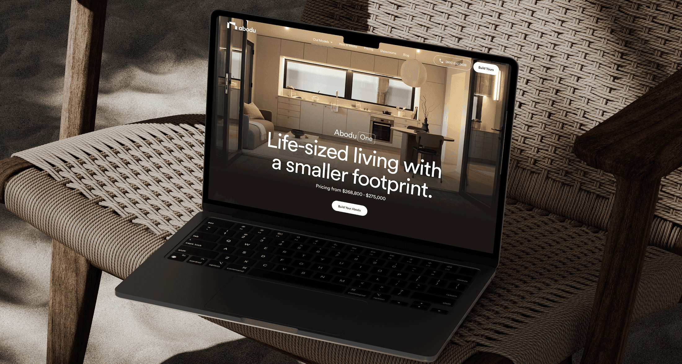 A modern website on a computer sitting on a chair.