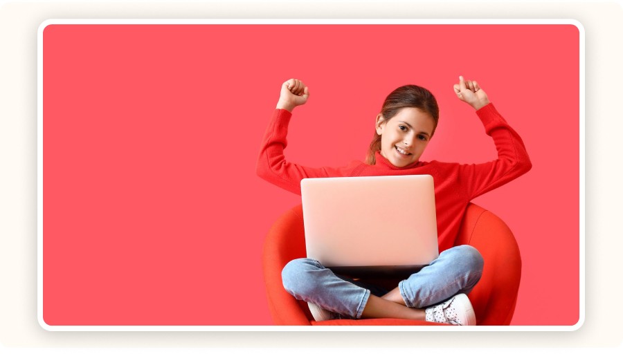 Happy girl using a laptop