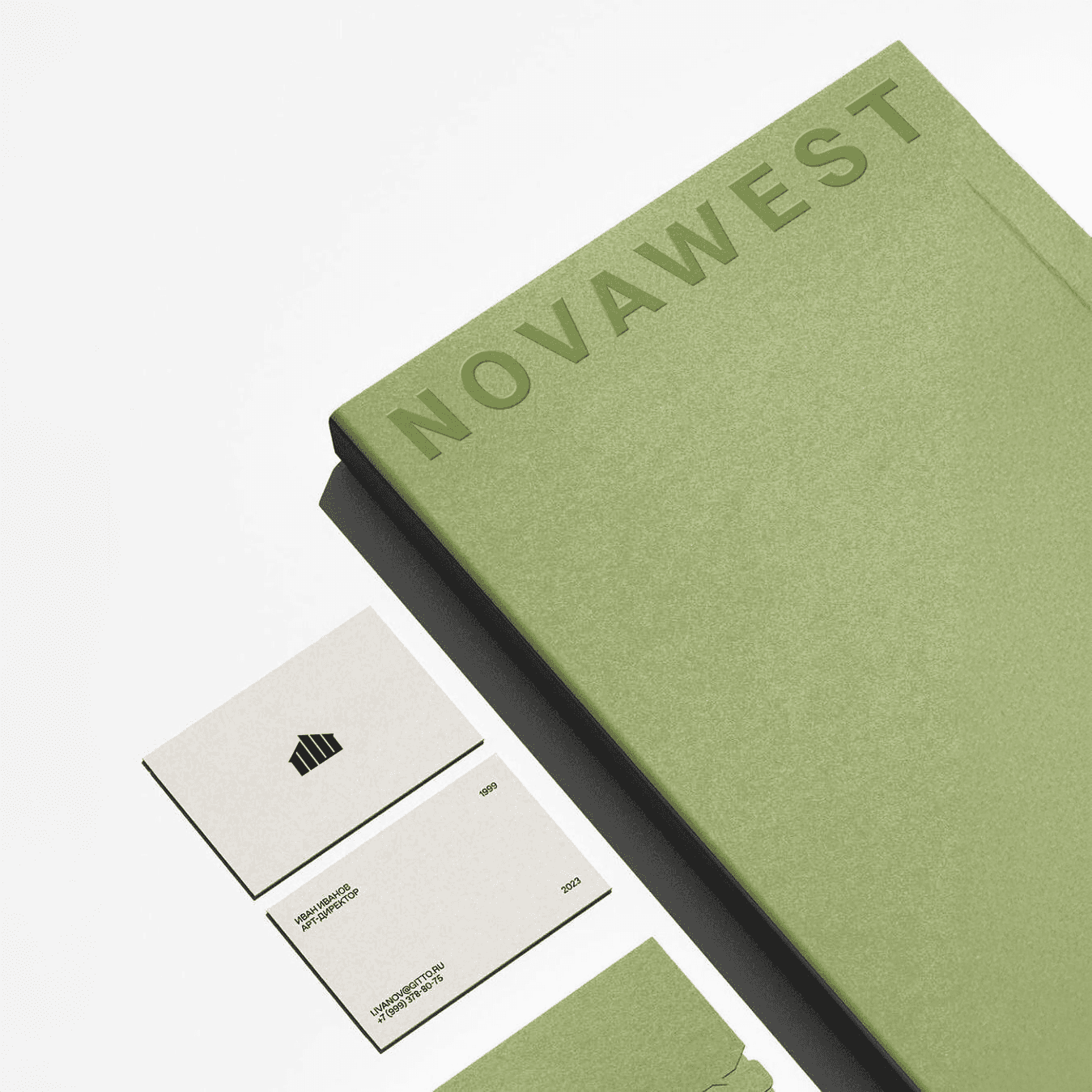 A minimalist branding mockup featuring a green folder with embossed text "NOVAWEST" and two business cards, one with a geometric house-like logo and the other with contact information.