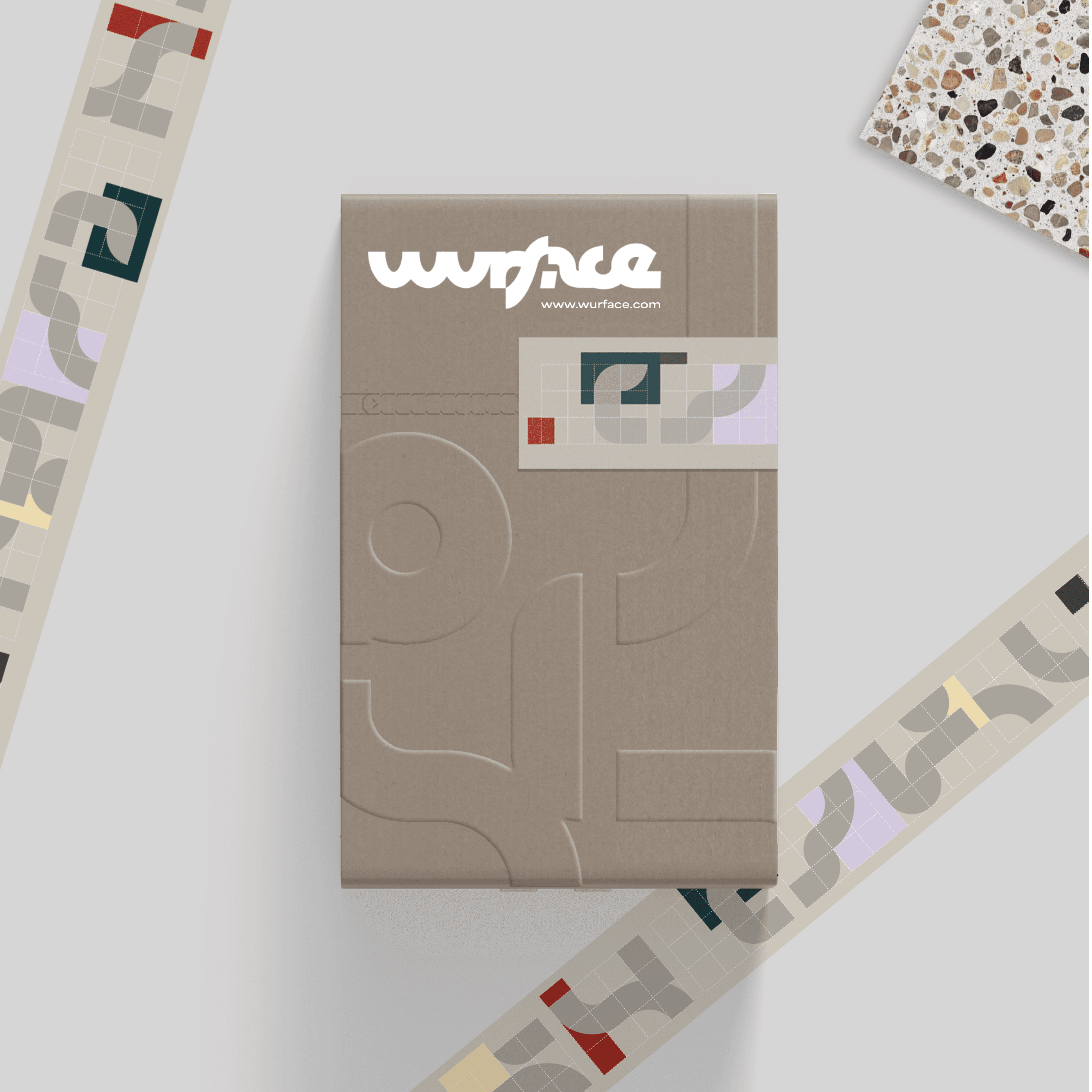 Wurface tile sample packaging featuring modular tile-inspired graphics designed by Josephine Grenier.
