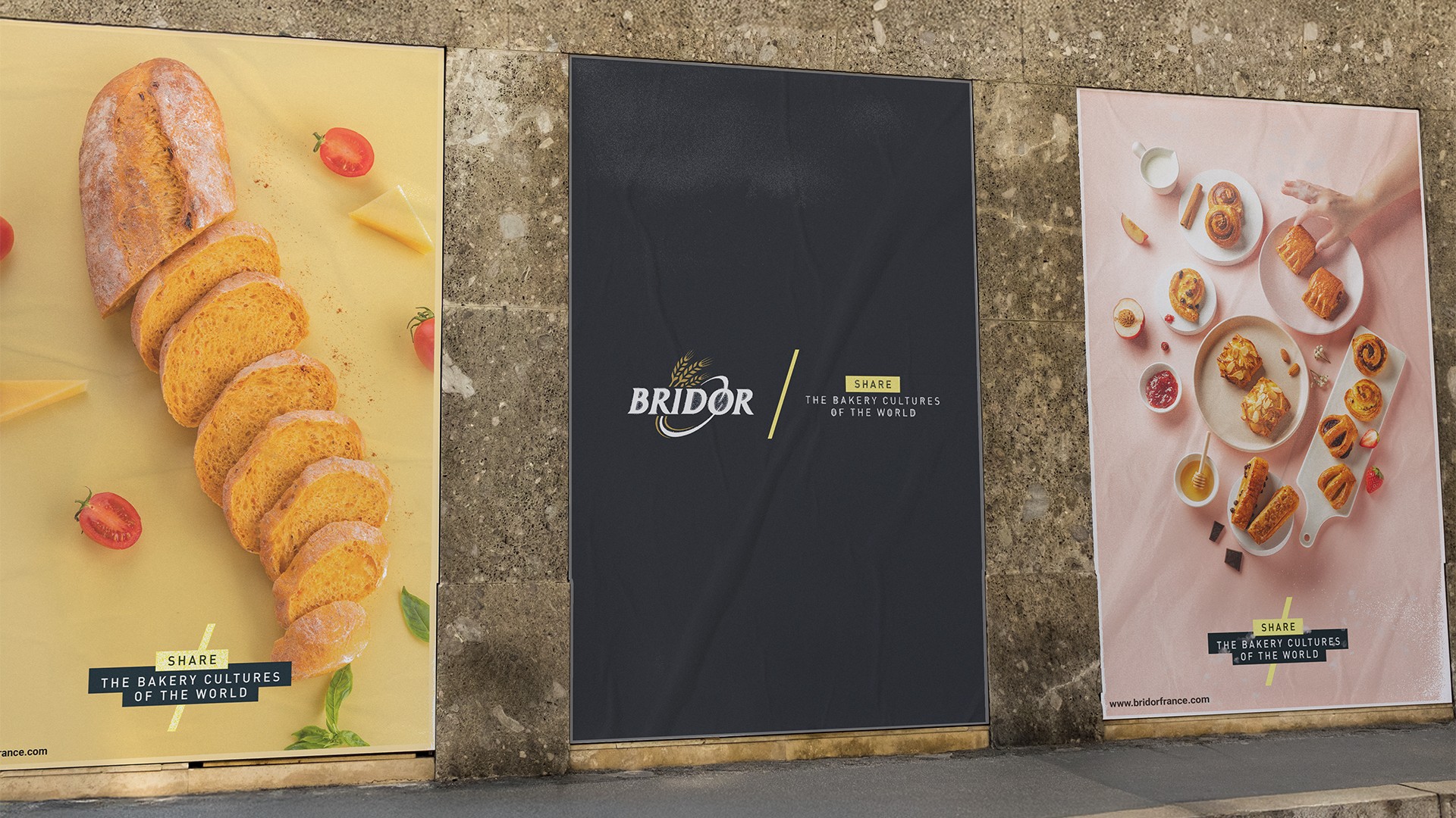 Streetside billboard with flyposters of the Batch.Works brand and illustrations