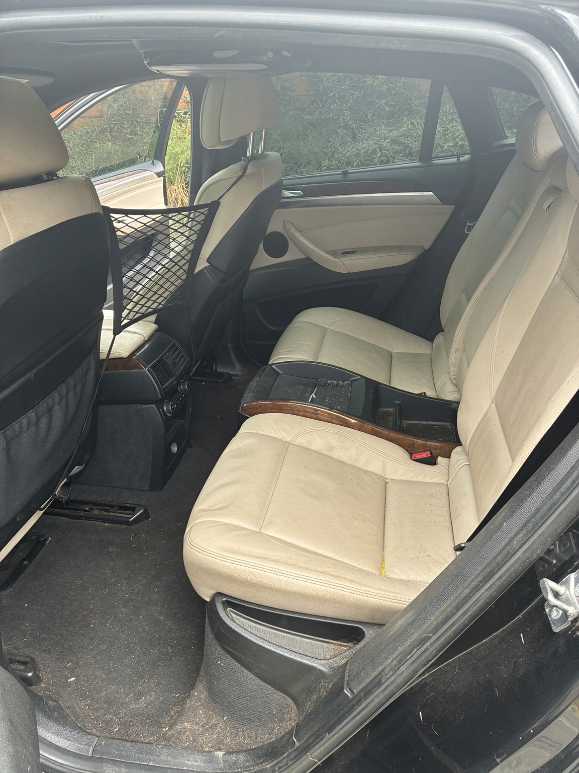 BMW rear cabin before mobile interior detailing