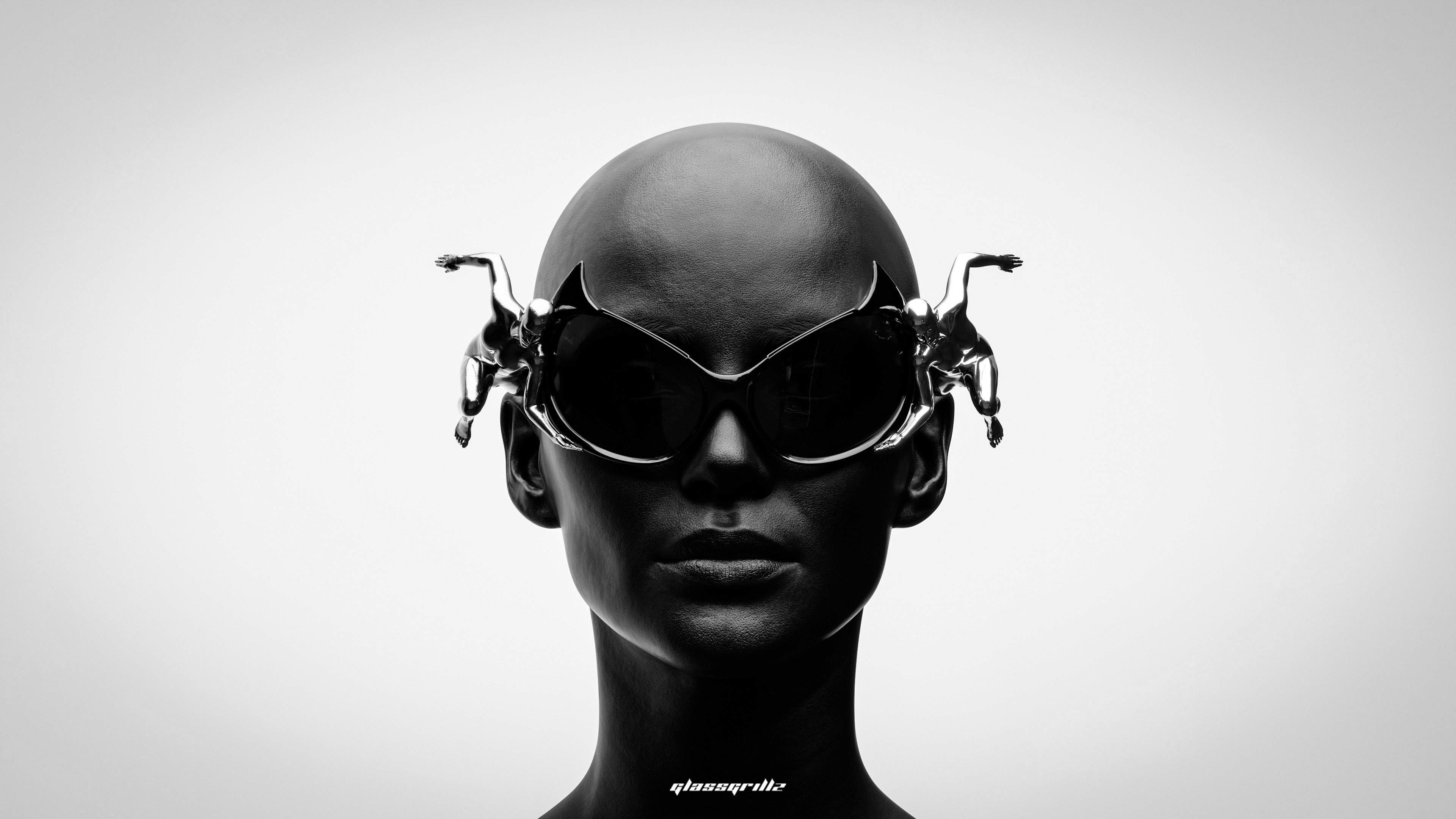 Female with dark skin wearing sunglasses with sterling silver accessoire, closeup