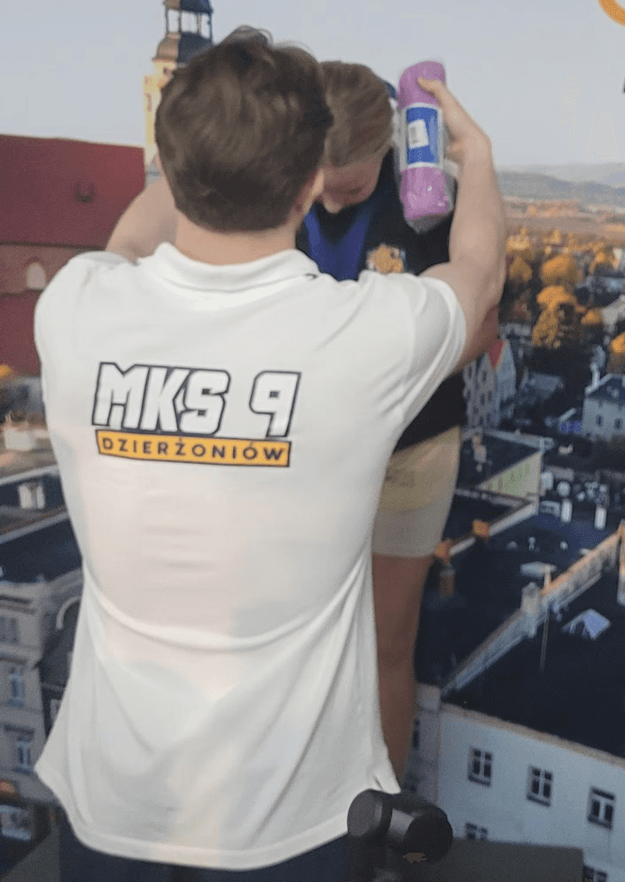 Surfer cleaning Surf board